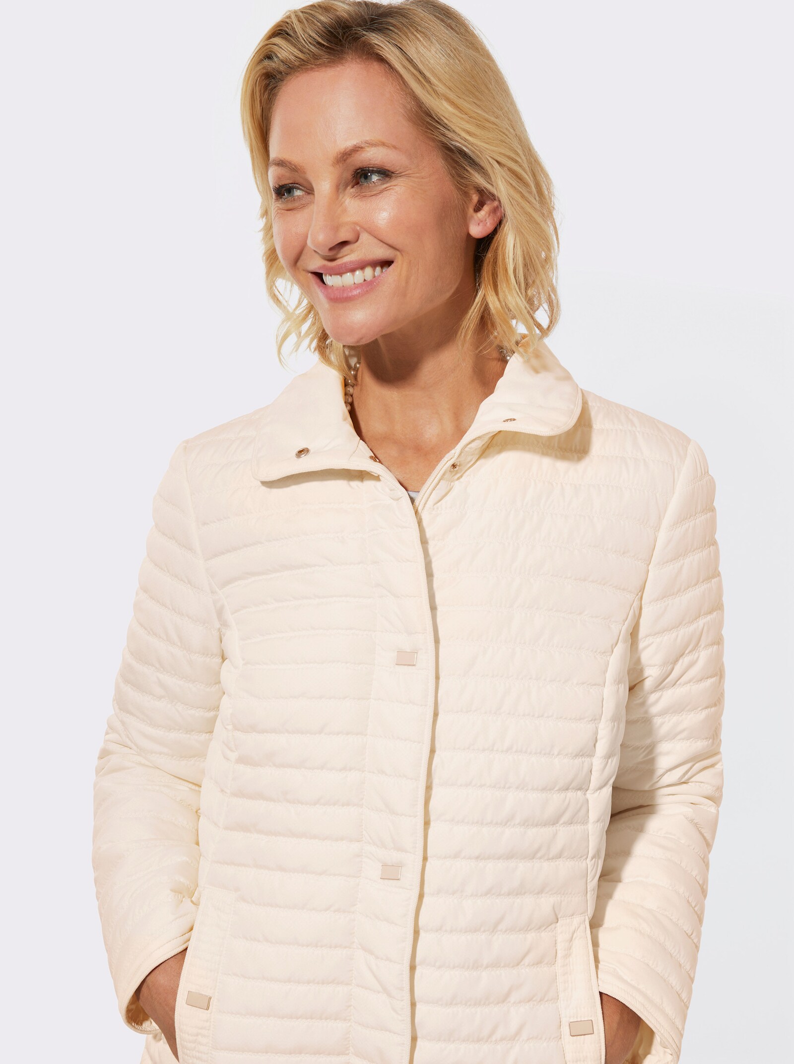 Steppjacke mit Druckknöpfen - champagner