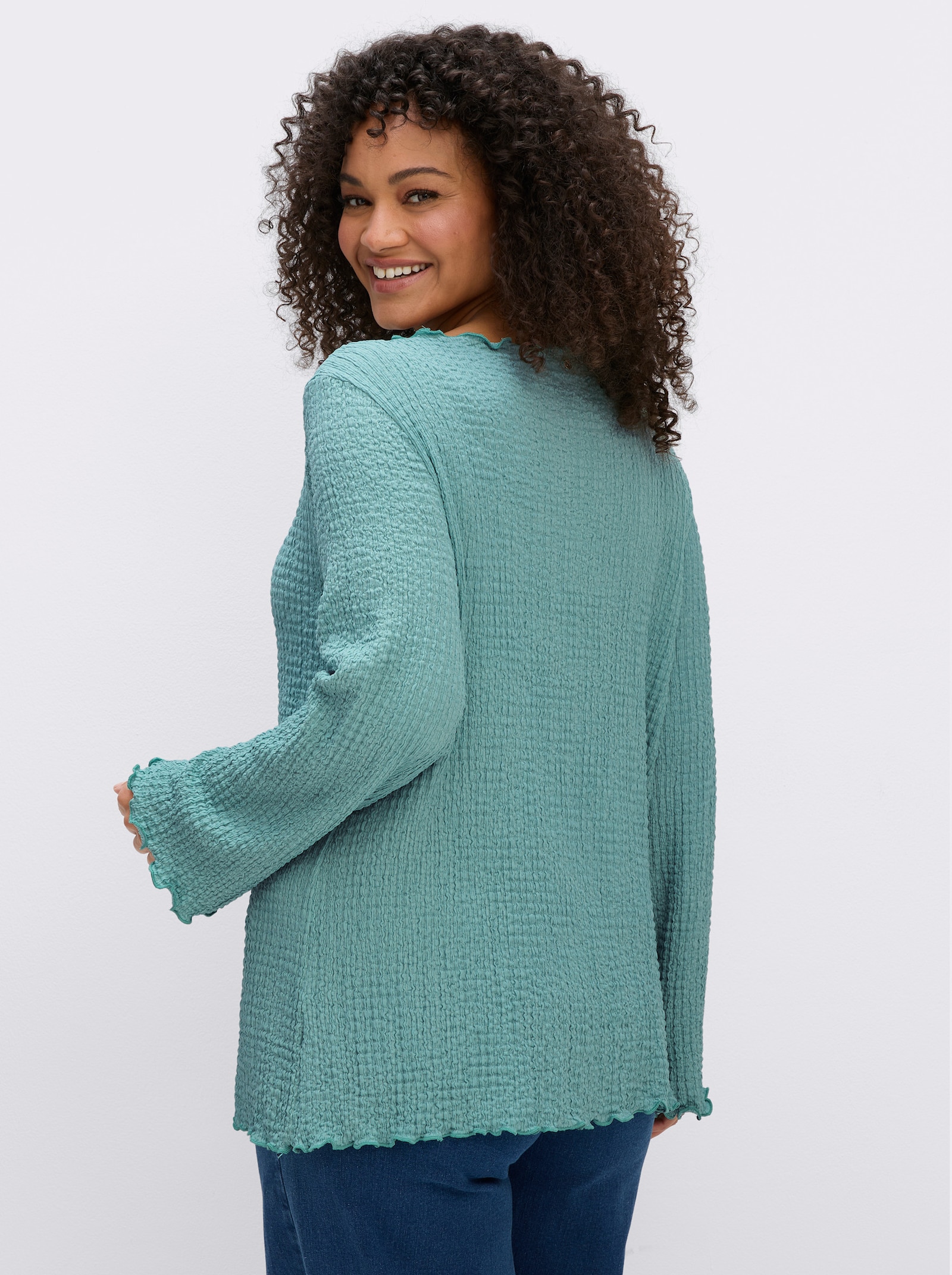 sheego Langarmshirt aus stretchiger Smok-Qualität - salbei