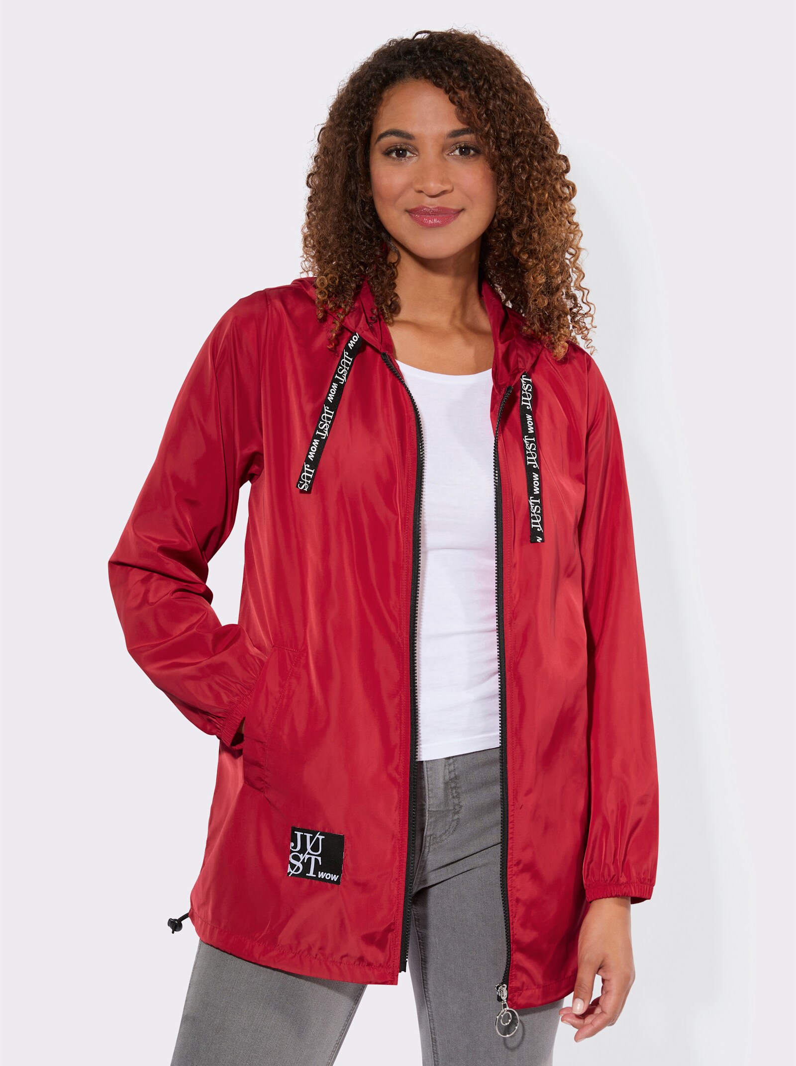 Kapuzenjacke mit Schriftzug im Comic-Stil - rot