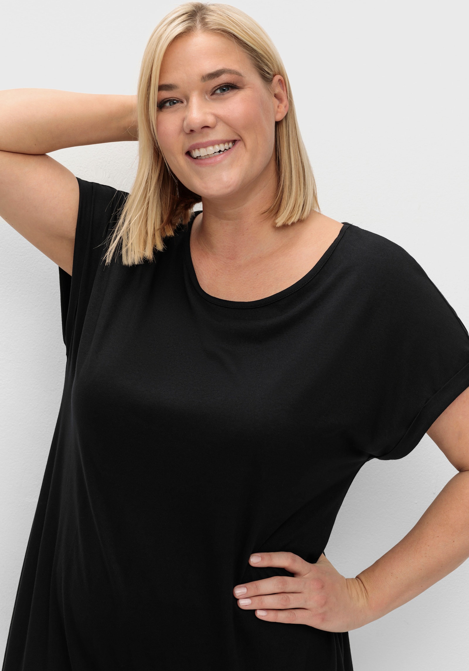 sheego Oversize-Shirt mit breitem Saumbündchen - schwarz