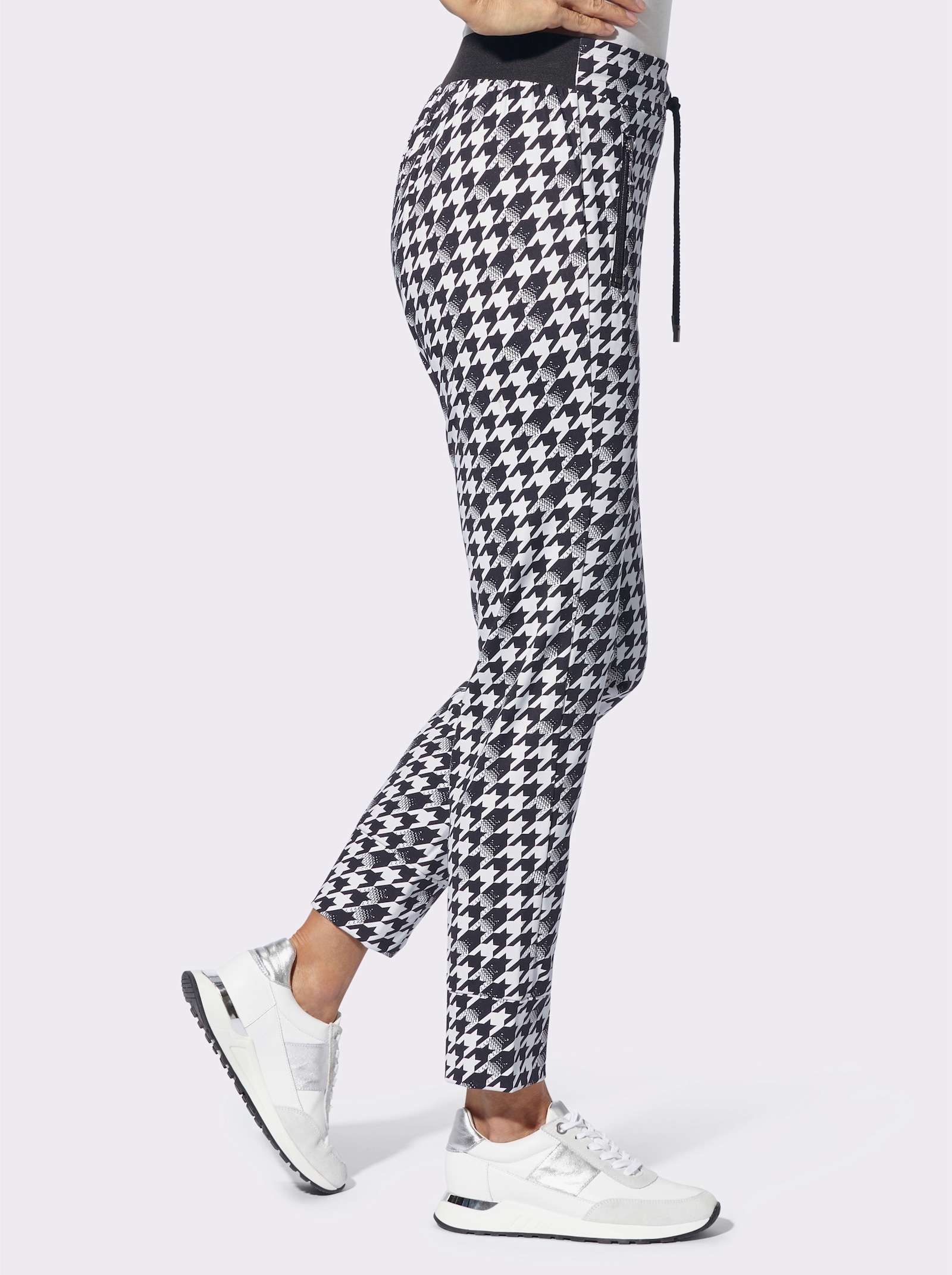 Jogpants met ritszakken - ecru/zwart geprint