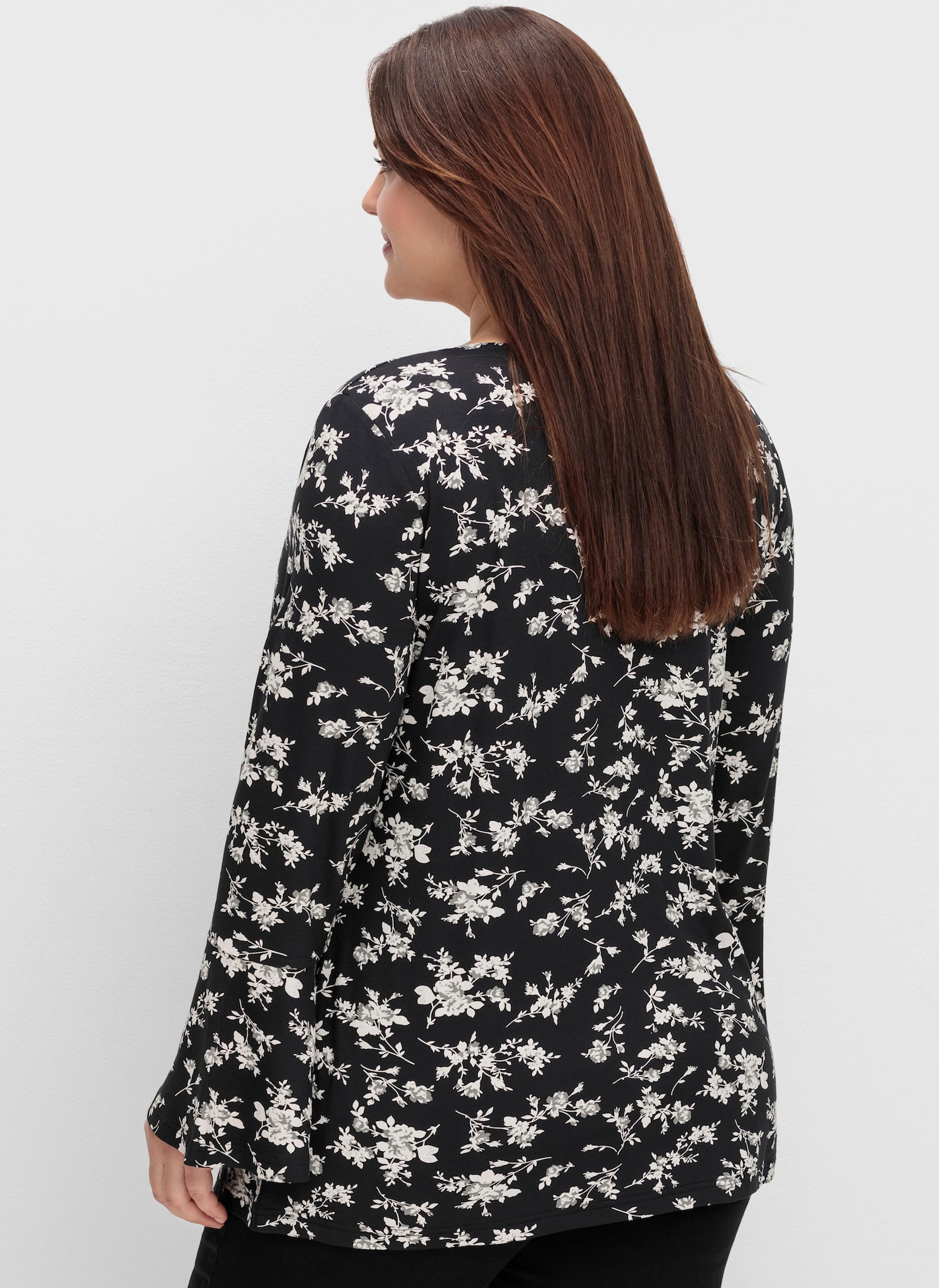 sheego by Joe Browns Langarmshirt mit Biesen und Volantärmeln - schwarz-gemustert