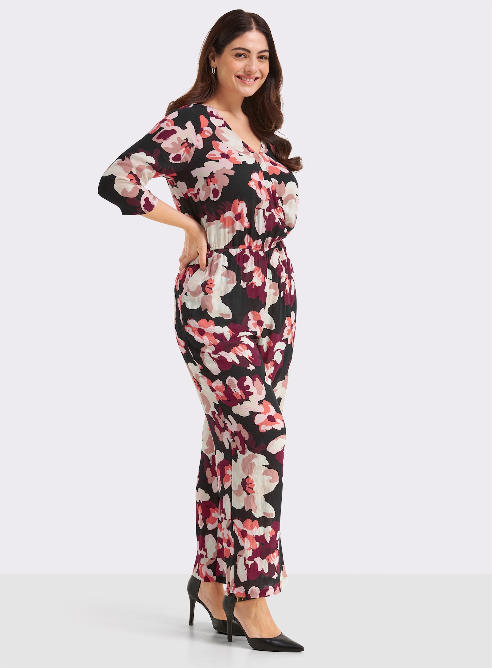 sheego Jumpsuit mit Blumenprint - schwarz-koralle-bedruckt