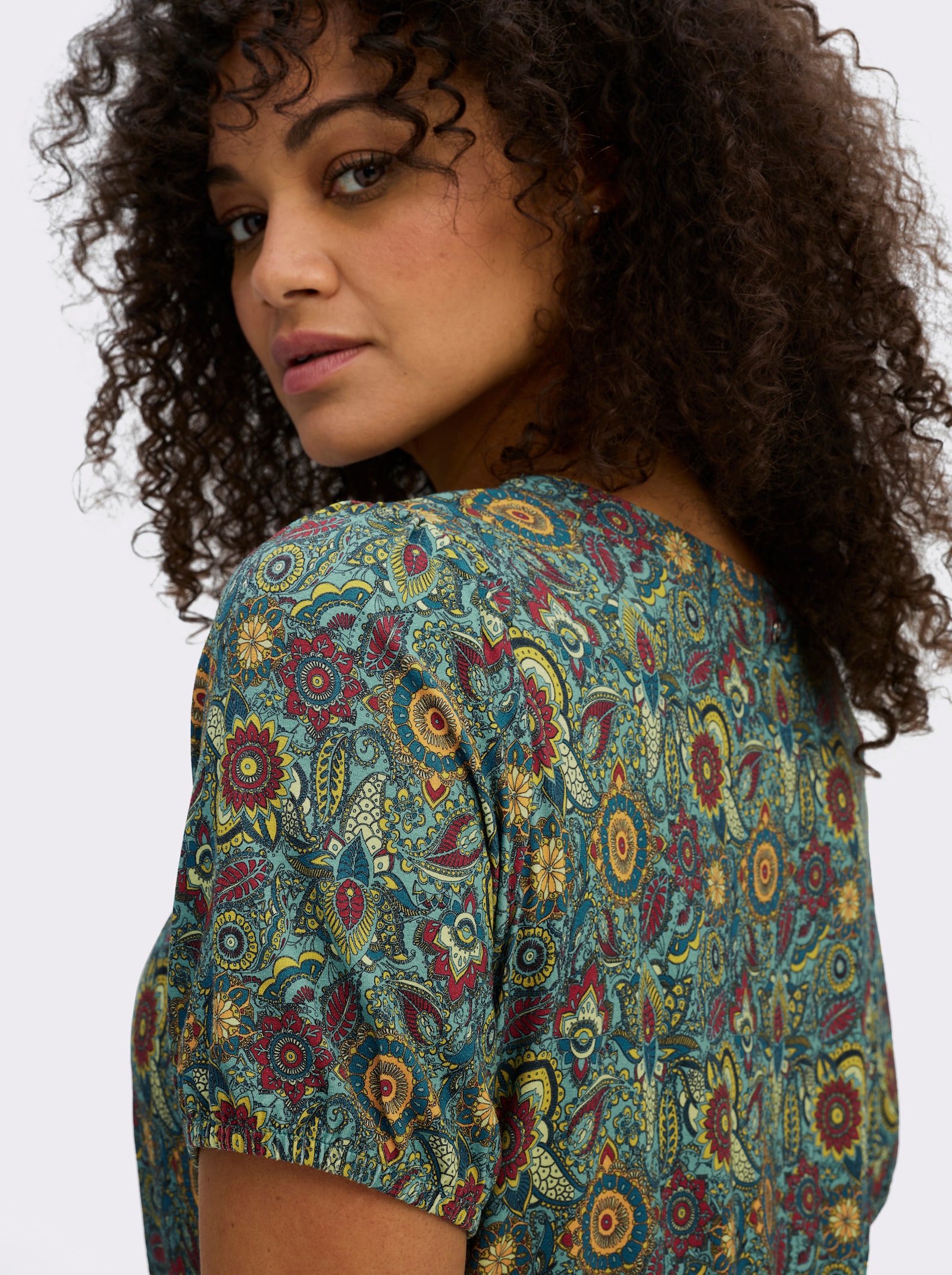 sheego Jerseyjurk met bloemenprint - oceaan/diepblauw bedrukt
