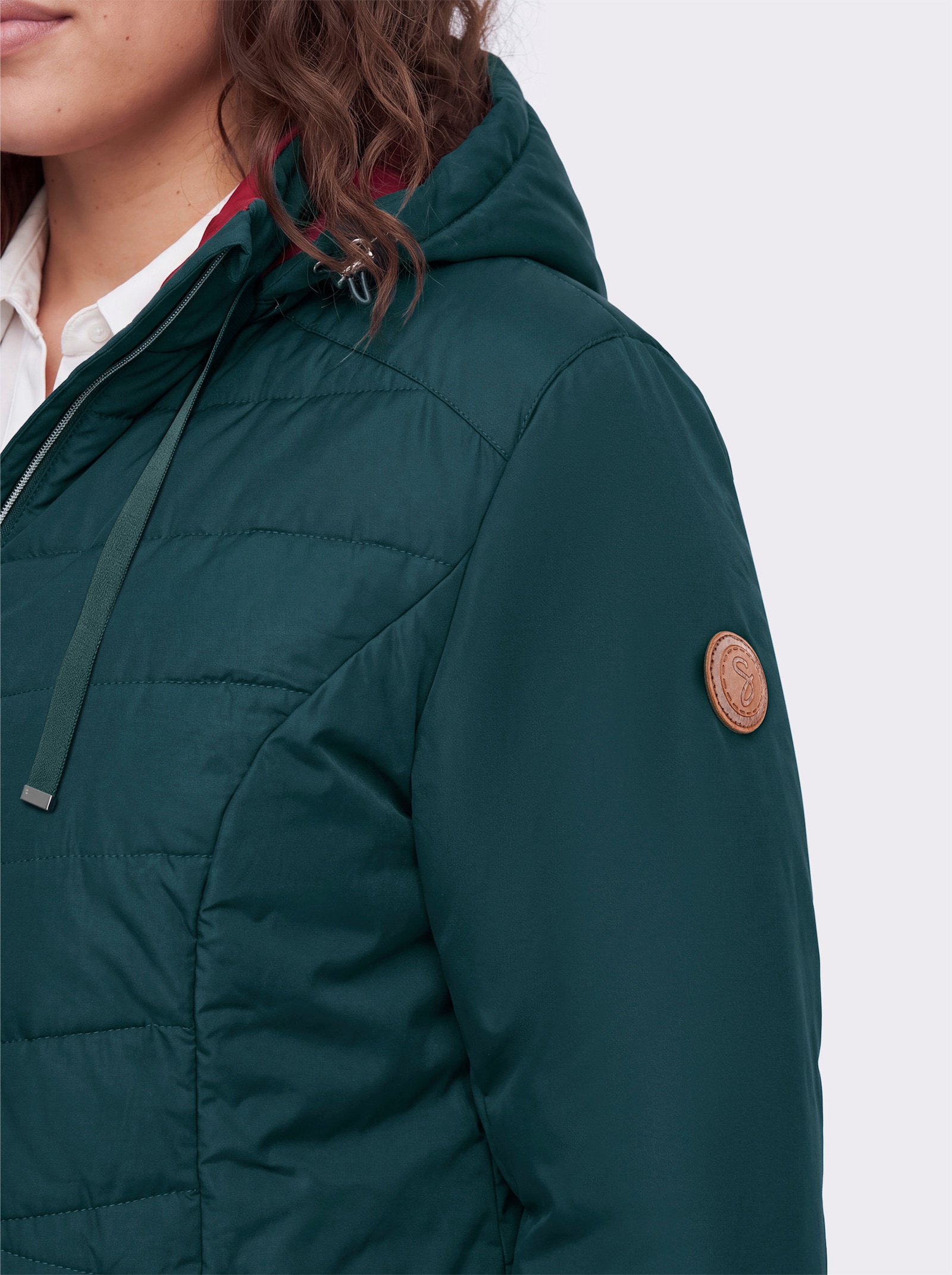 sheego Outdoorjacke mit schmeichelndem V-Steppmuster - aquapetrol