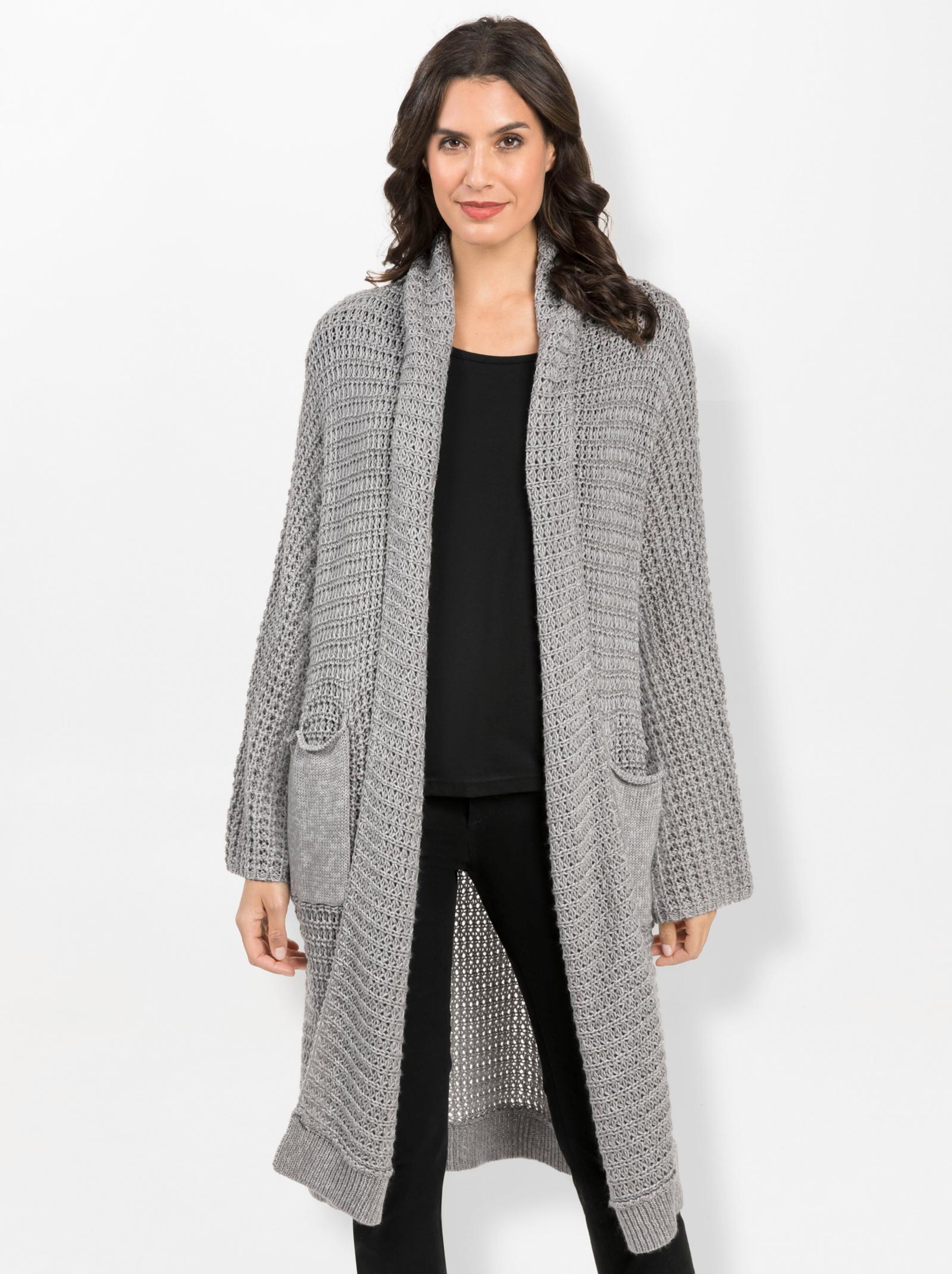 Lang gebreid vest