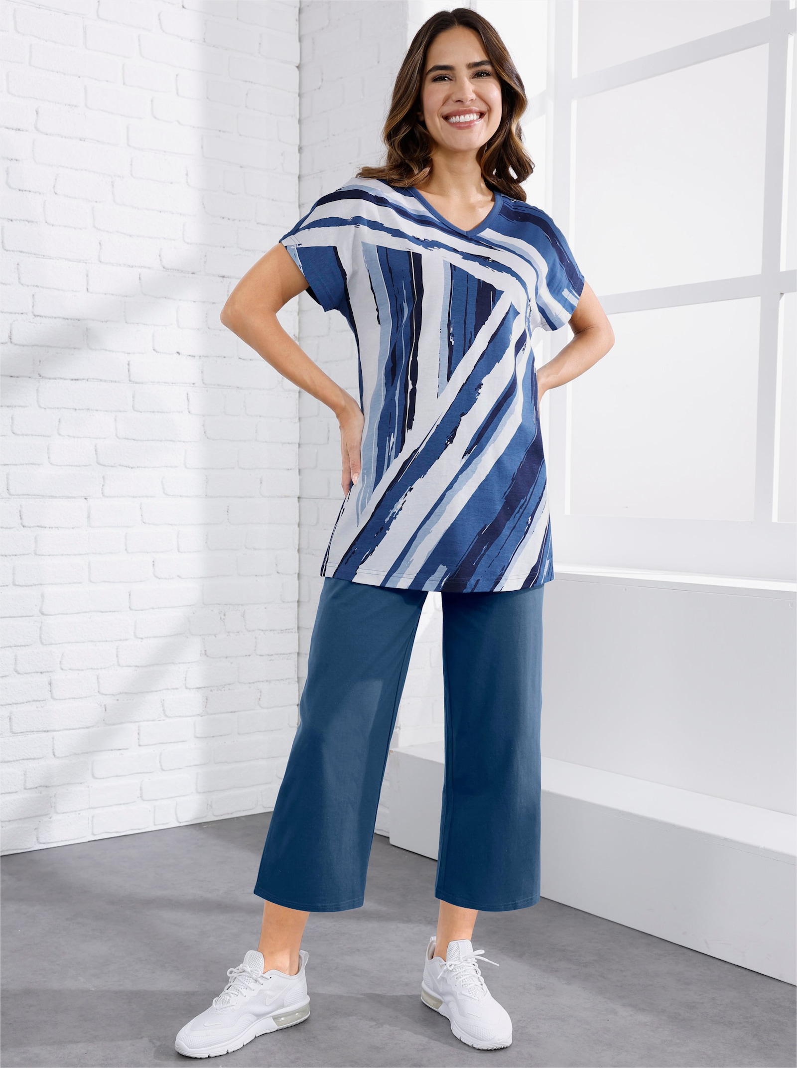 7/8 kalhoty se široce střiženými nohavicemi - džínová modrá