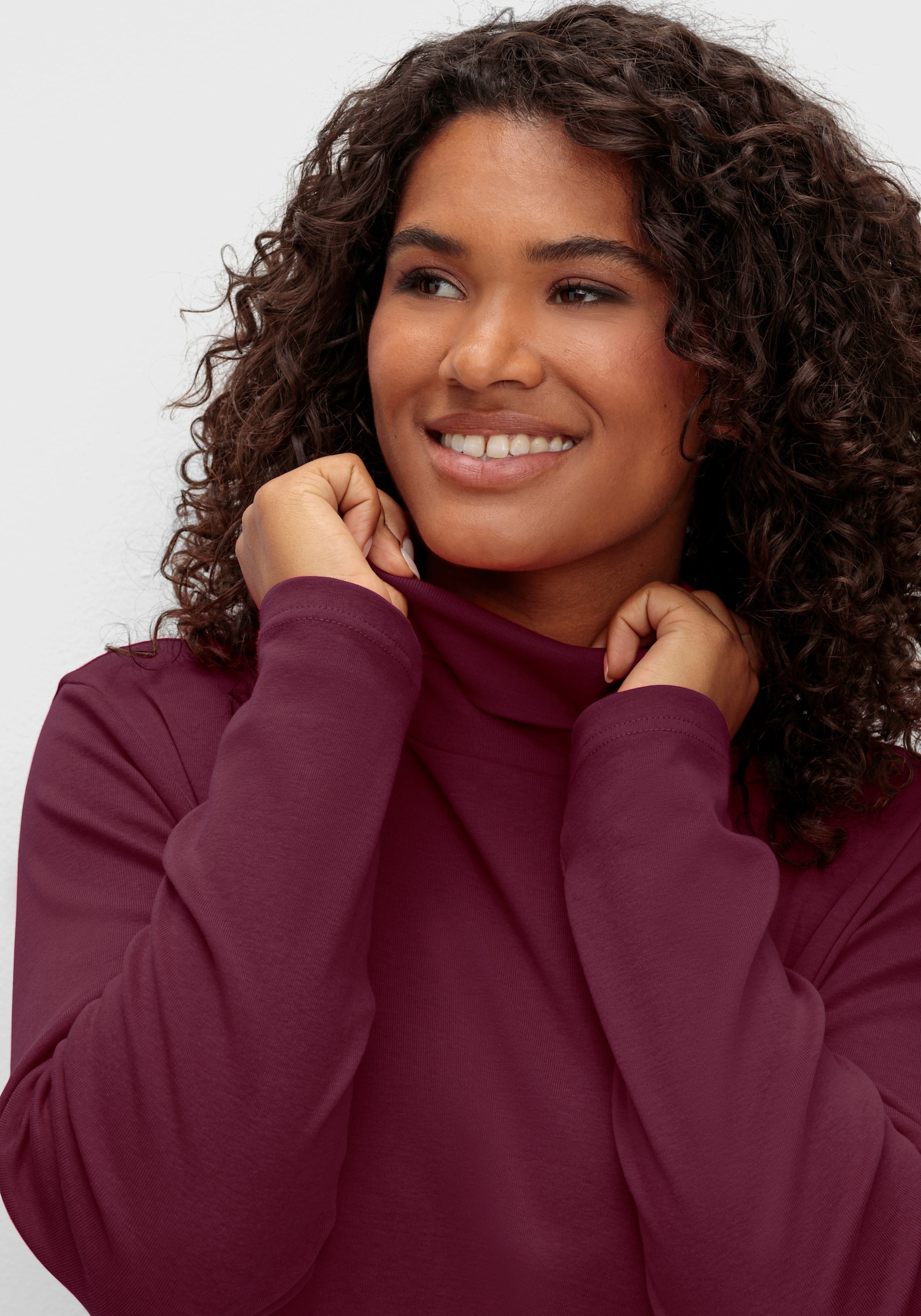 sheego Rollkragenshirt in A-Linie - bordeaux