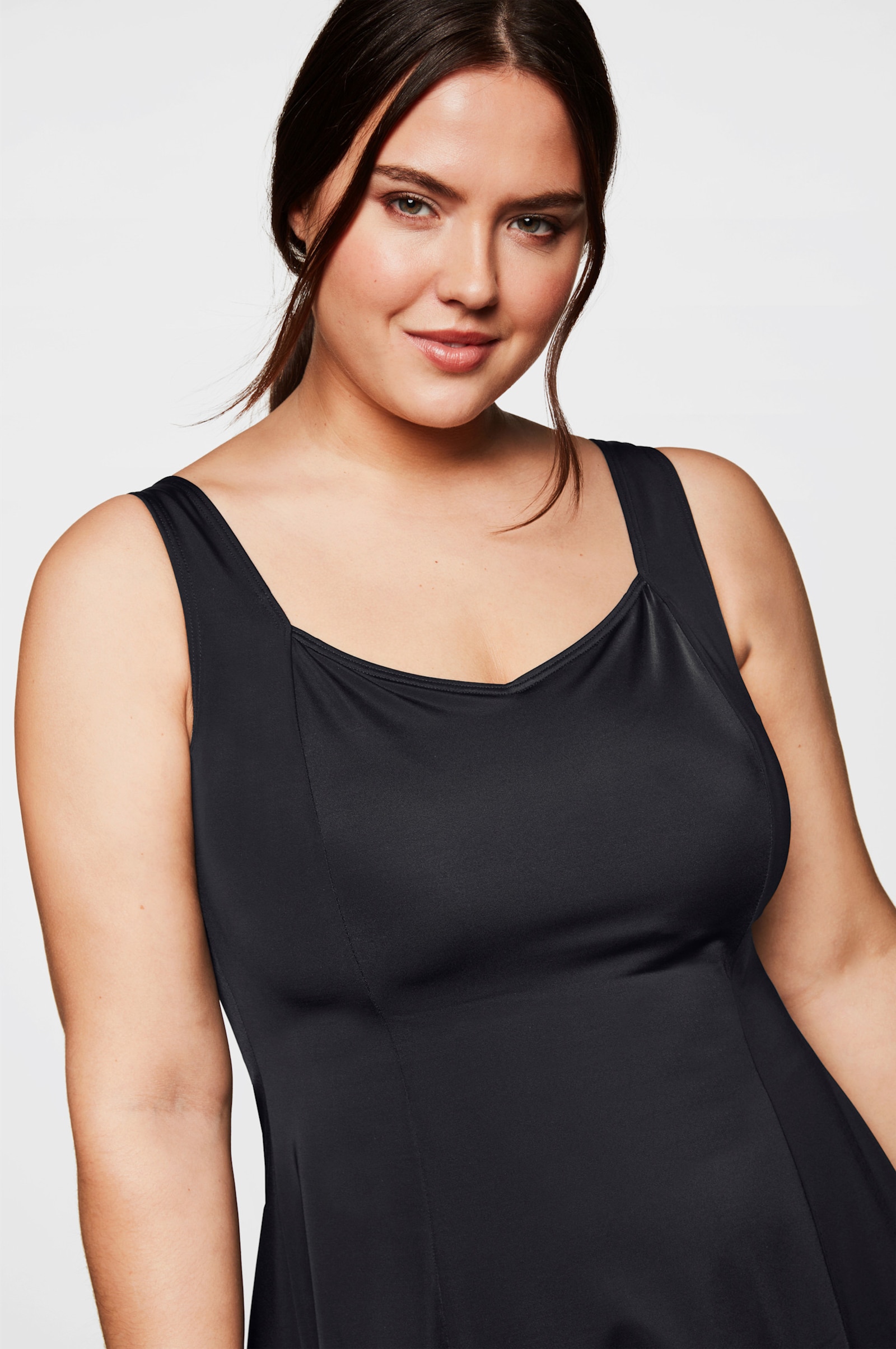 sheego Badekleid mit integrierter Hose und Shaping-Effekt - schwarz