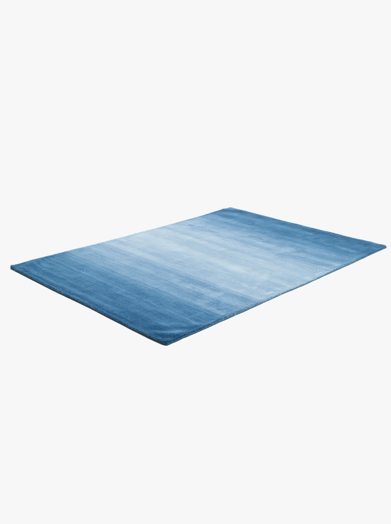 Theko Handwebteppich - blau