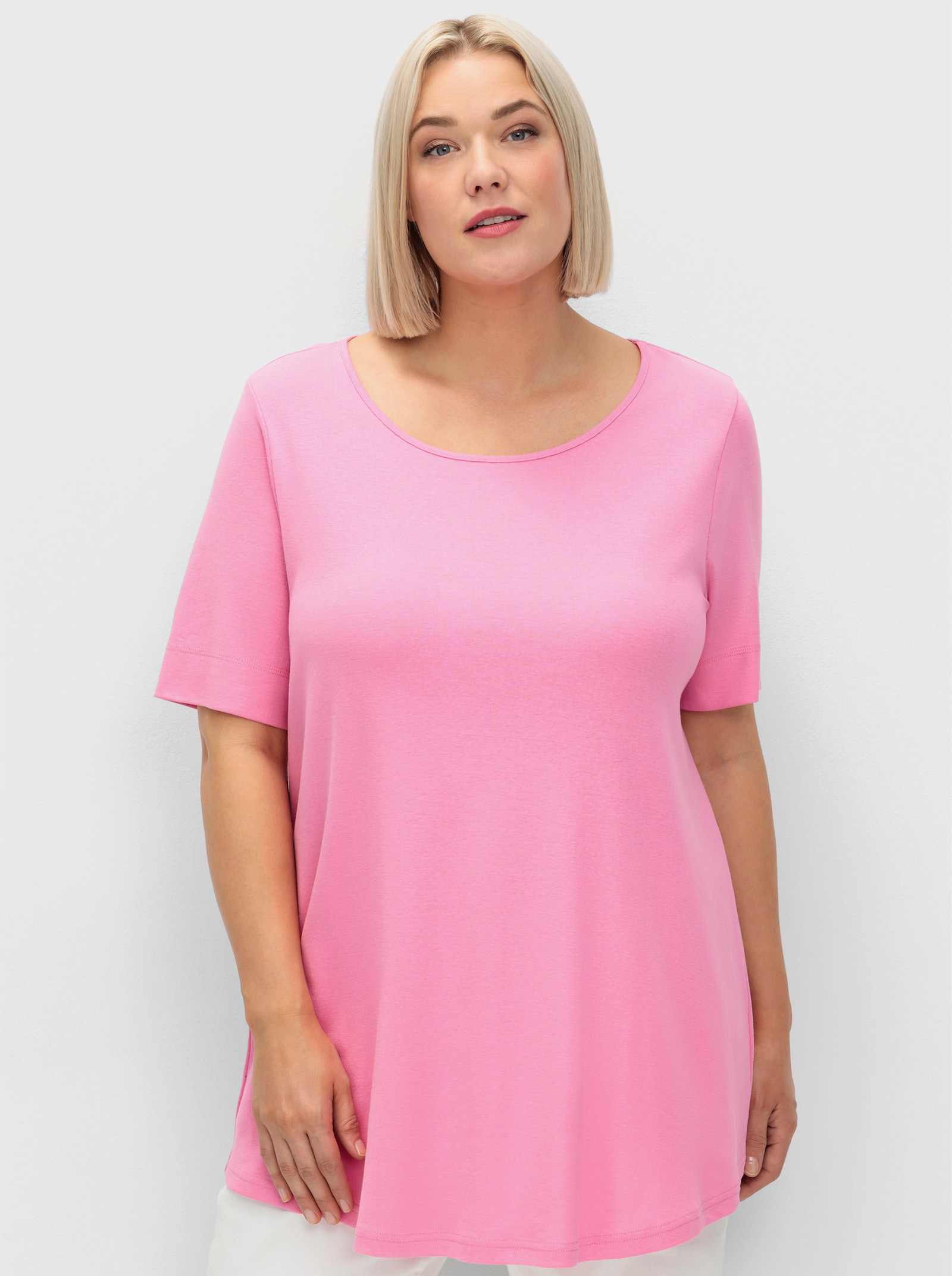 sheego Longshirt mit abgerundetem Saum - blumiges pink