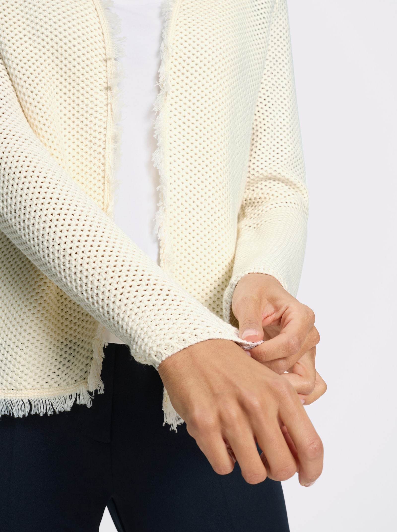 Strickjacke mit Fransen - champagner