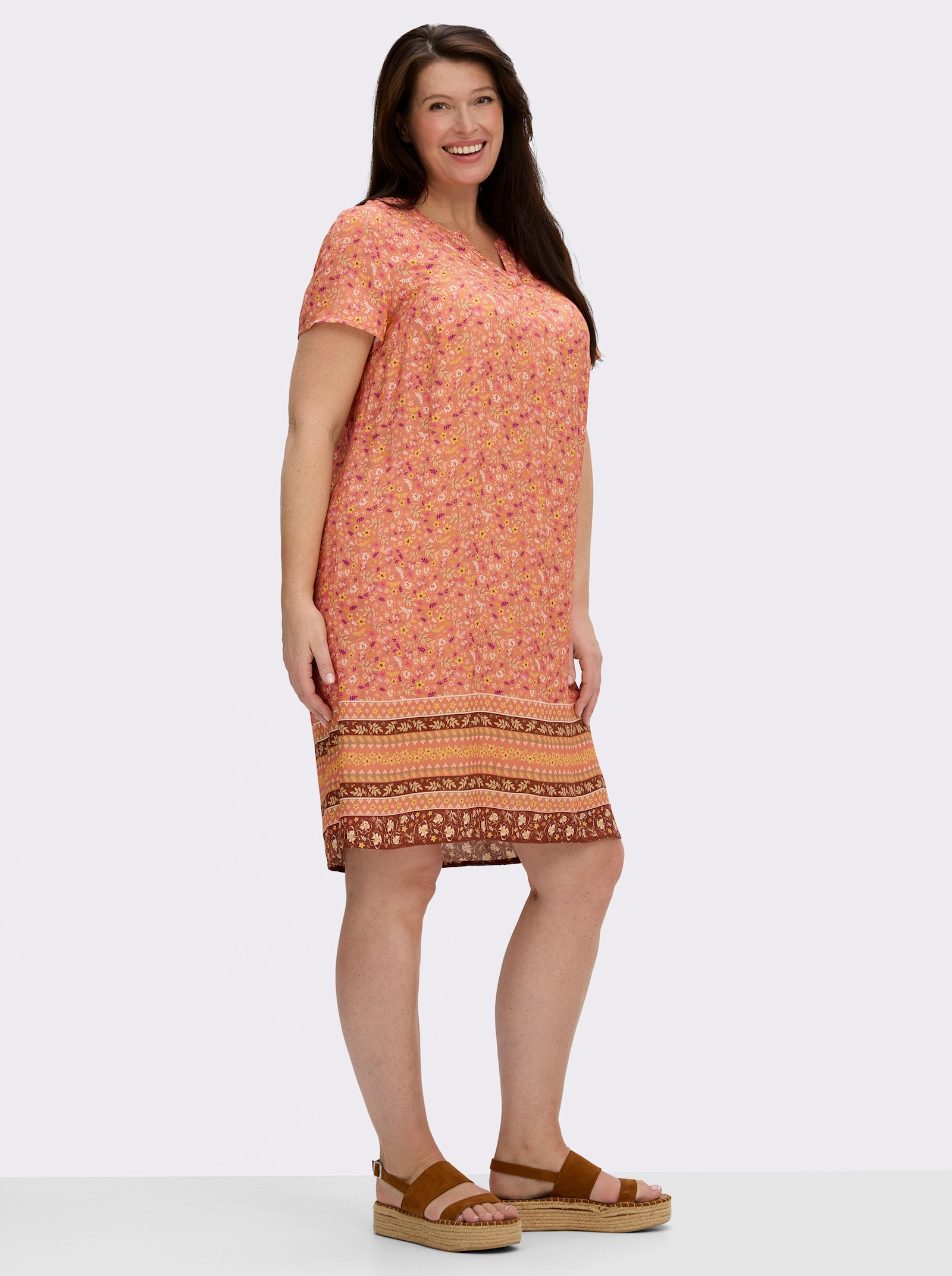 Druckkleid mit Blümchen- und Bordürenmuster - papaya-rotbraun-bedruckt