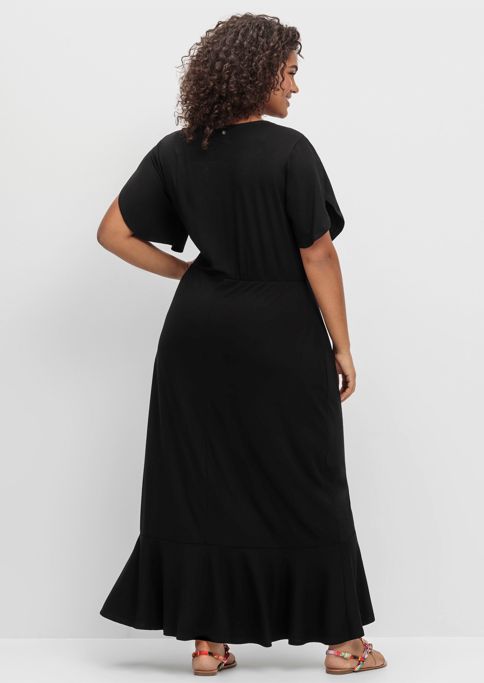 sheego Jerseyjurk in wikkellook, met volantrok - zwart