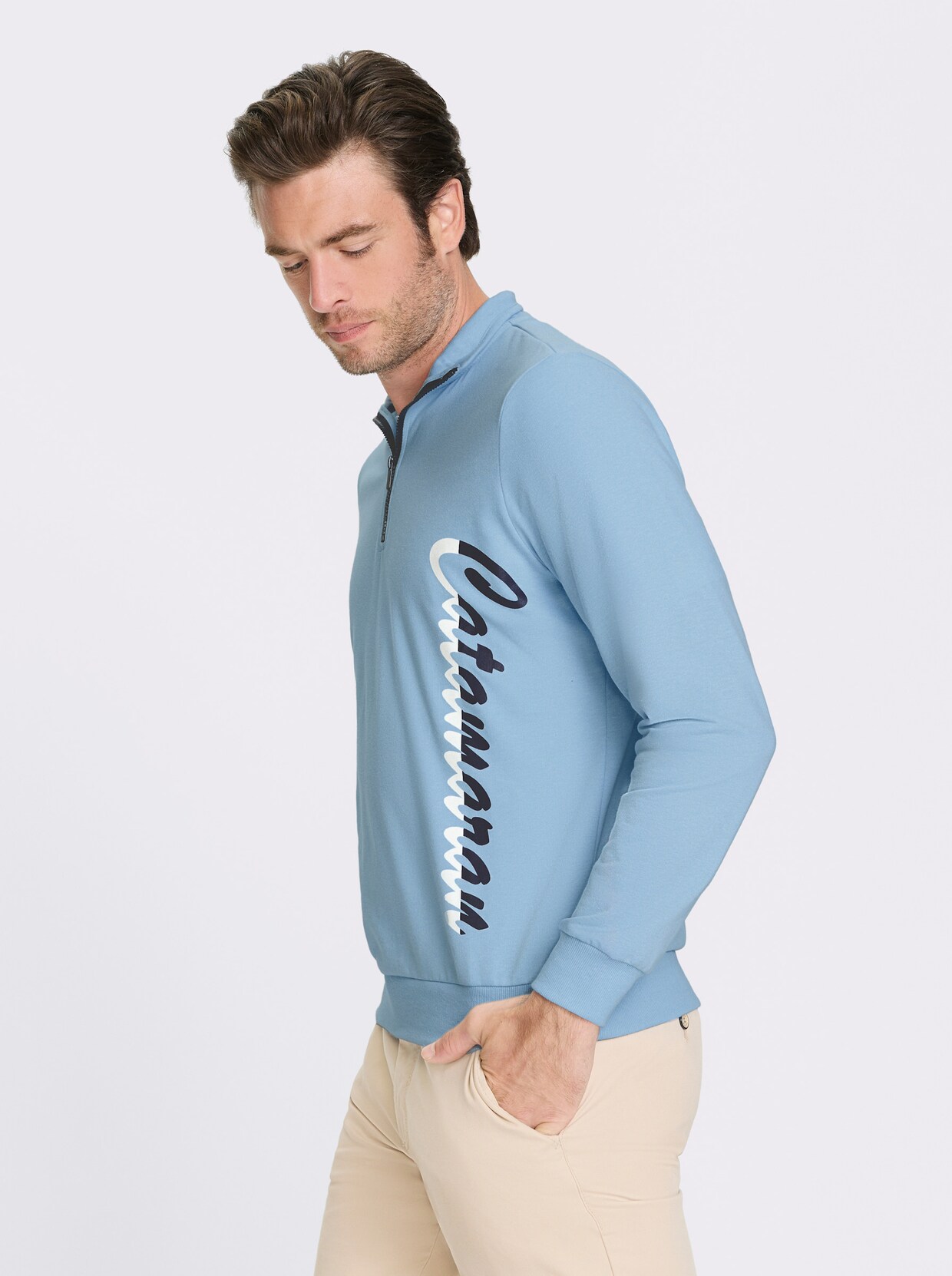 Catamaran Langarmshirt mit Schriftzug, vertikal - eisblau-meliert