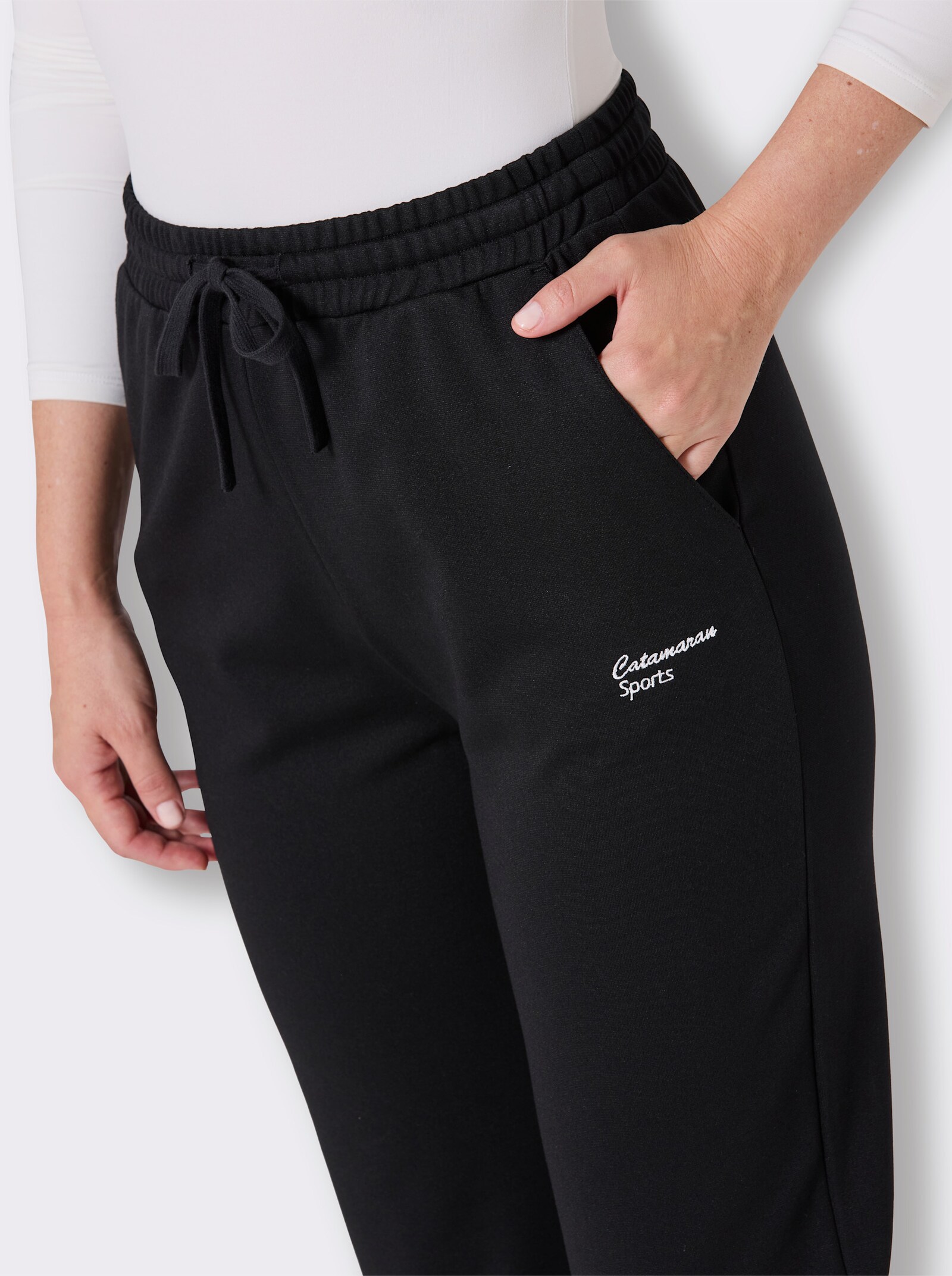 Catamaran Sports Sporthose mit seitlichen Taschen - schwarz-rot