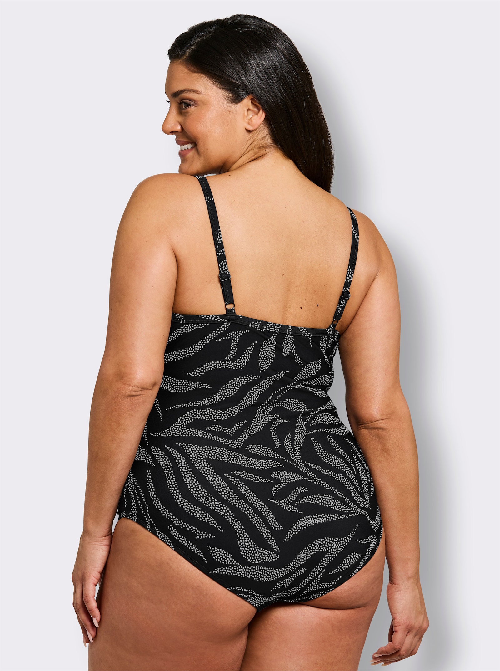 sheego Badeanzug mit Mesh-Einsatz und Shaping-Effekt - schwarz-weiß-bedruckt