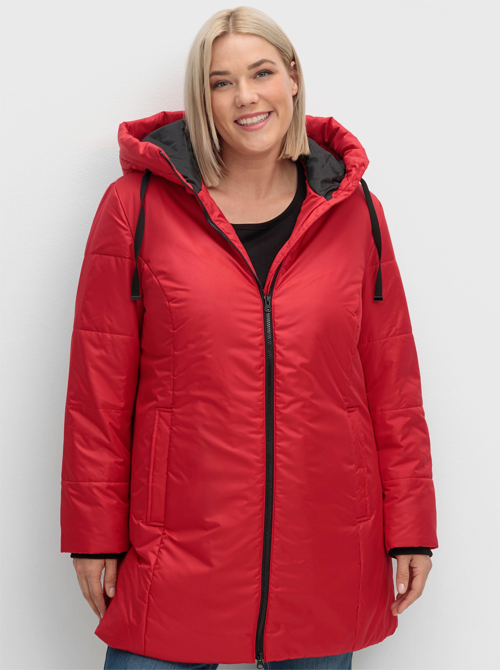 Stark wärmende Longjacke mit Steppmuster - rot