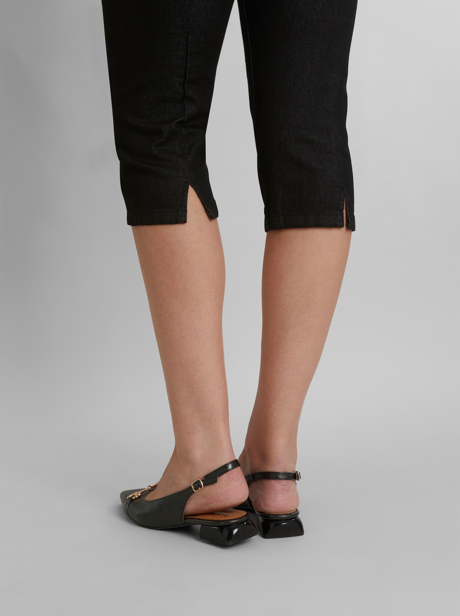 heine Caprijeans mit Seitenschlitzen - schwarz