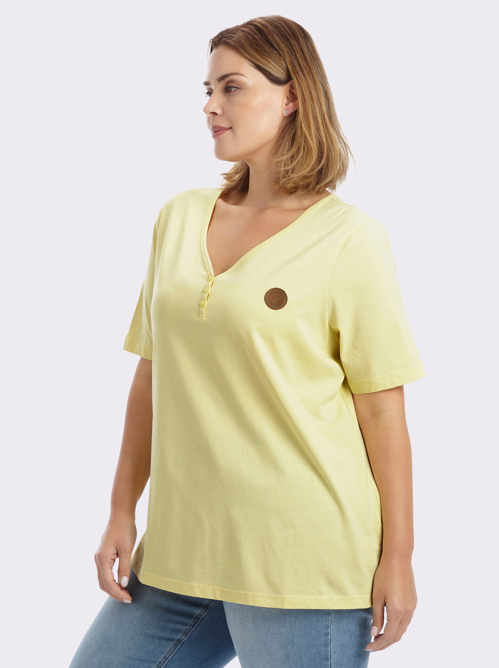 sheego Shirt met V-hals en korte sierknoopsluiting - citroen