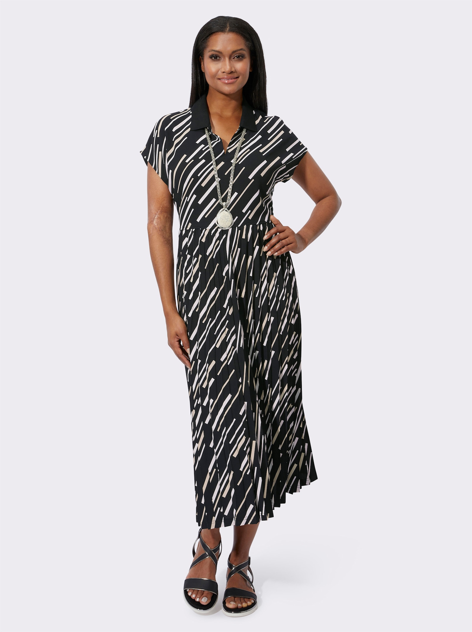 Plisséjurk met polokraag en V-hals - zwart/zand geprint