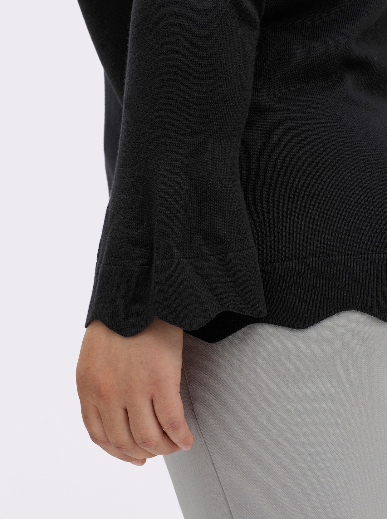 Strickpullover mit Wellenkanten - schwarz