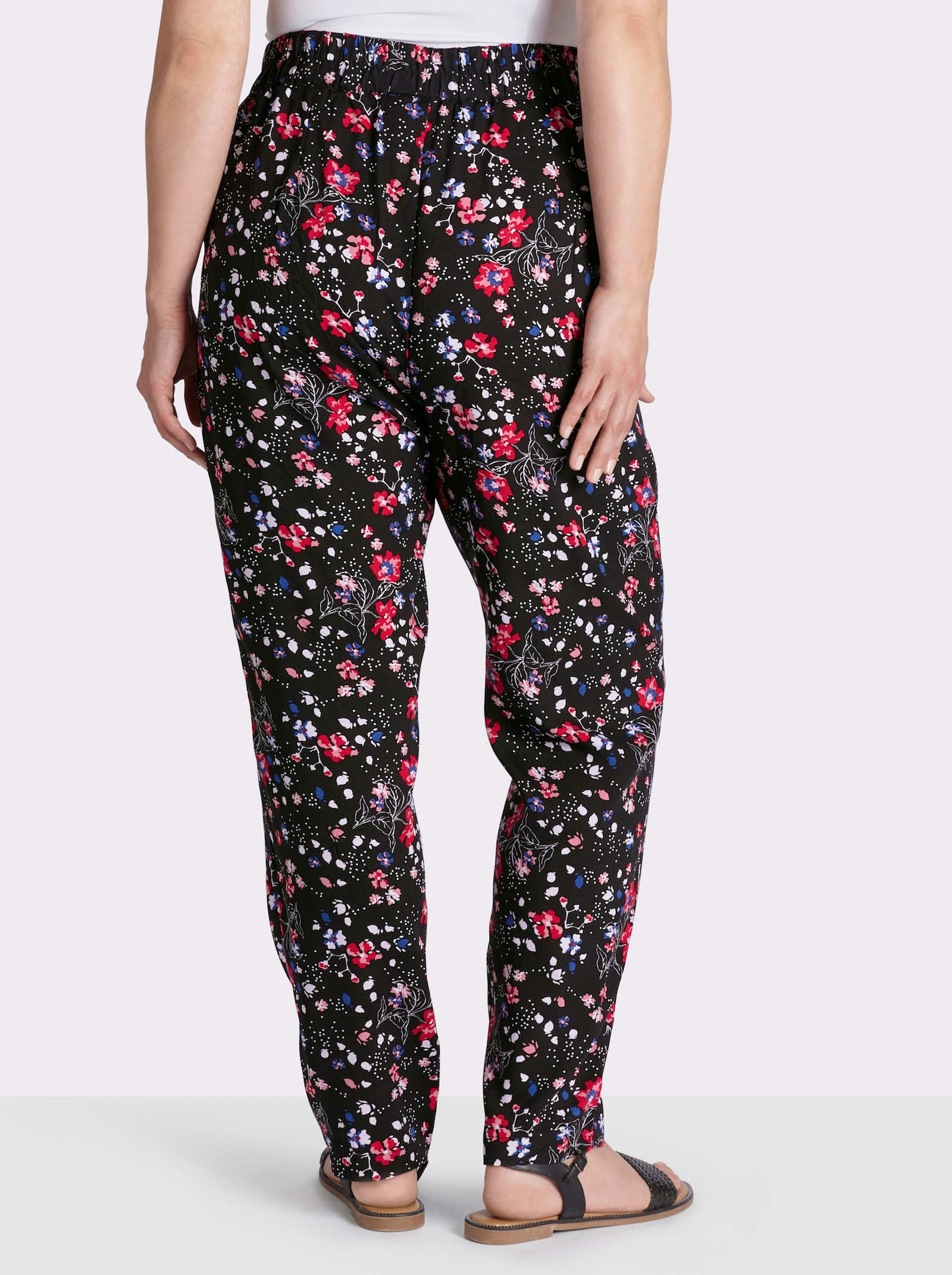 Schlupfhose mit floralem Druck - schwarz-erdbeere-bedruckt