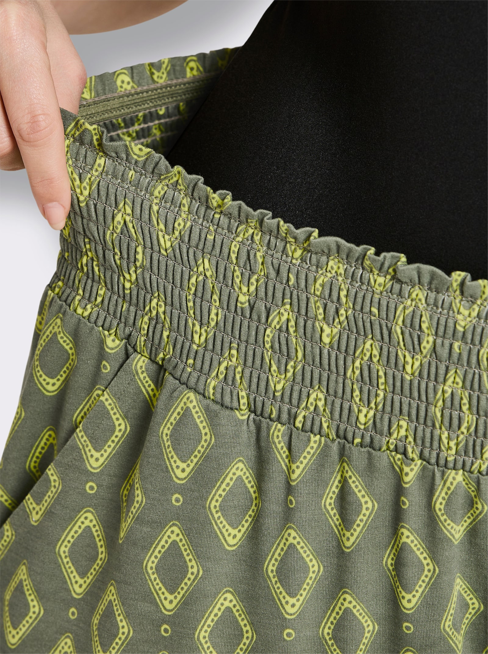 sheego Jogpants met print rondom - kaki gedessineerd