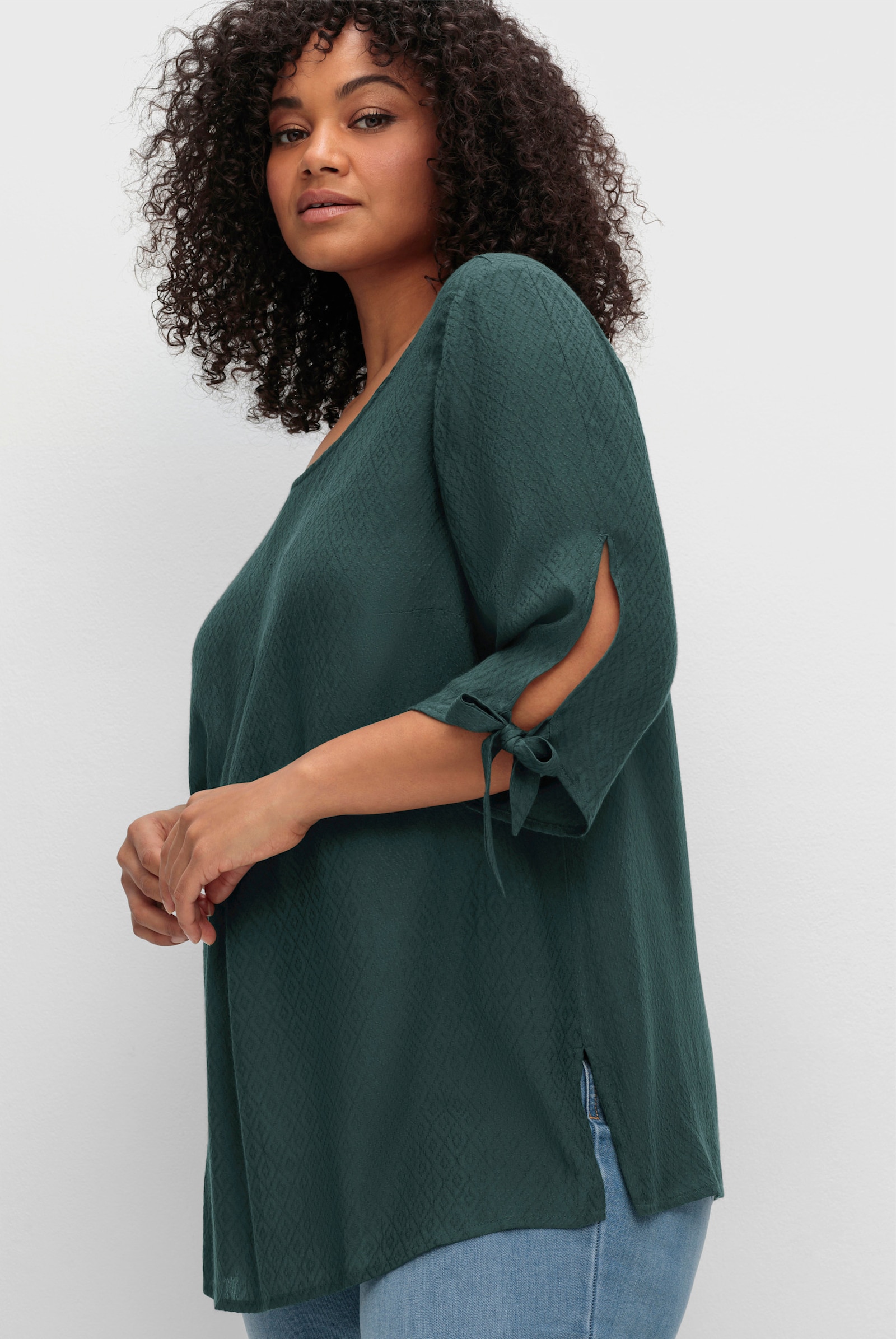 sheego Tunika mit Ärmeldetails und V-Ausschnitt hinten - tiefgrün