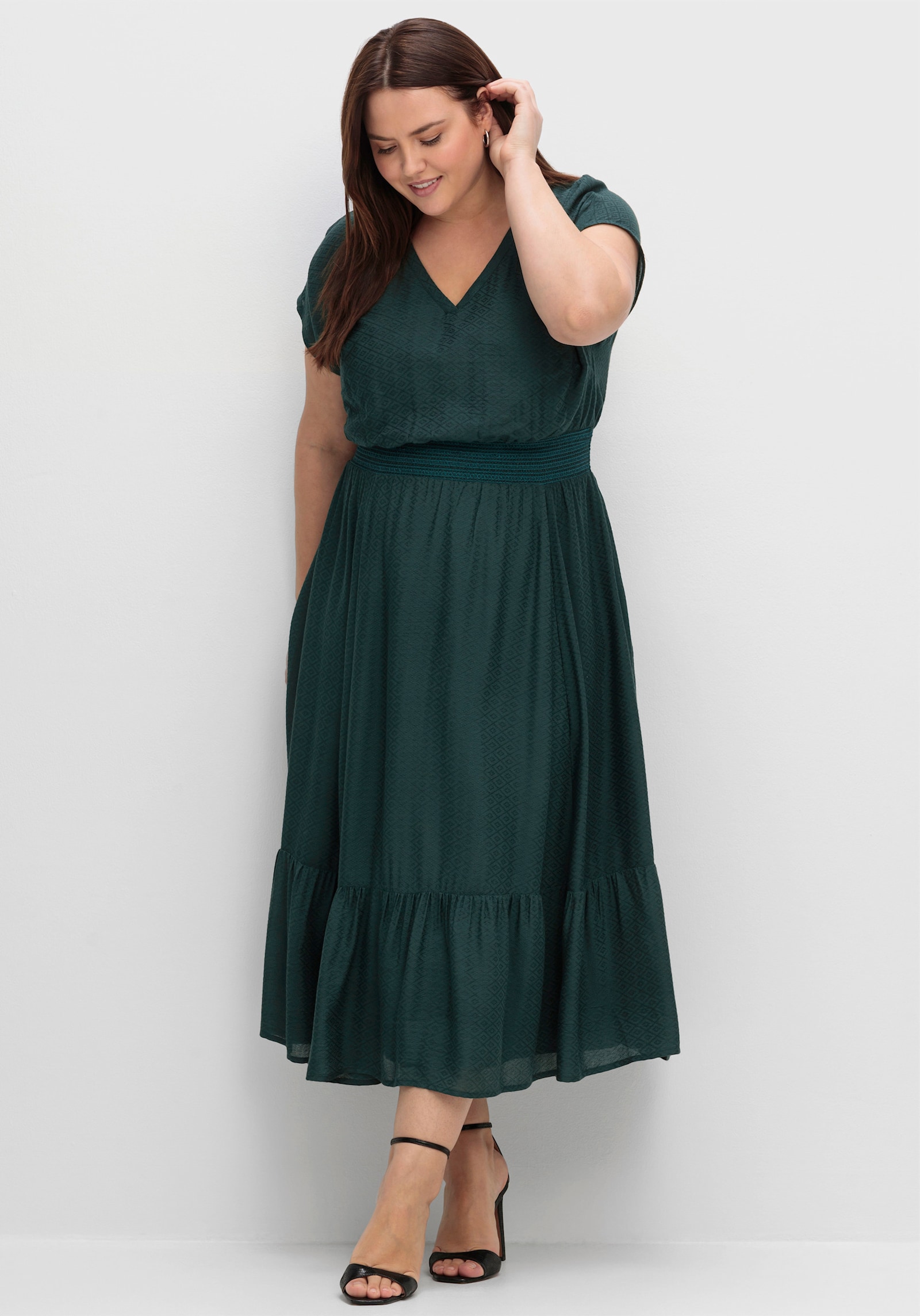 sheego Maxikleid mit Smokbund und Volant am Saum - tiefgrün