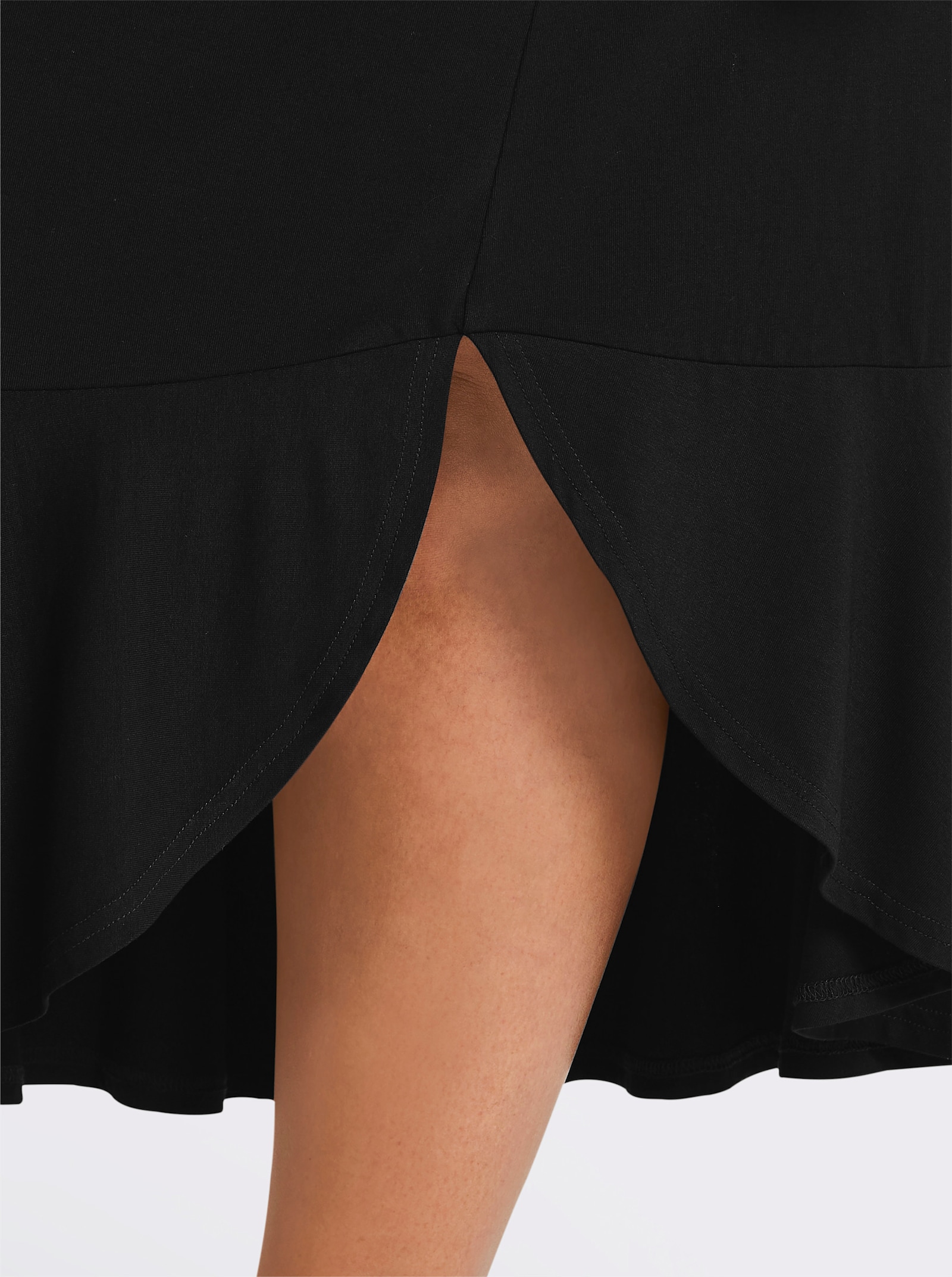 sheego Schlupfrock mit asymmetrischem Saum - schwarz