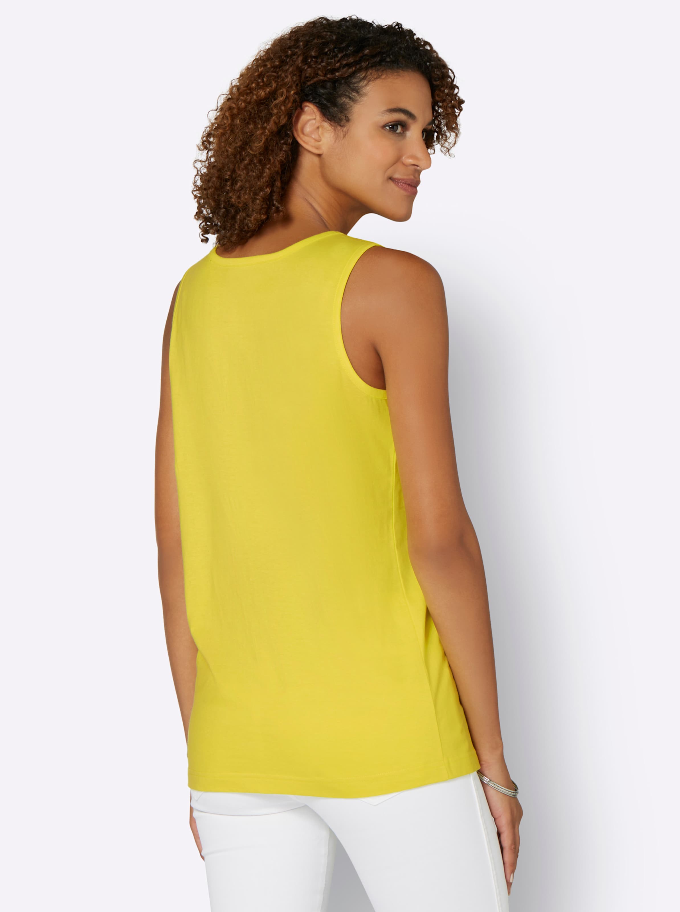 Basic Shirt günstig Kaufen-Shirttop in limone von heine. Shirttop in limone von heine <![CDATA[Schlichtes Shirttop – kombistarkes Basic mit einem Hauch Lässigkeit! Ärmellos, mit Rundhals-Ausschnitt.]]>. 