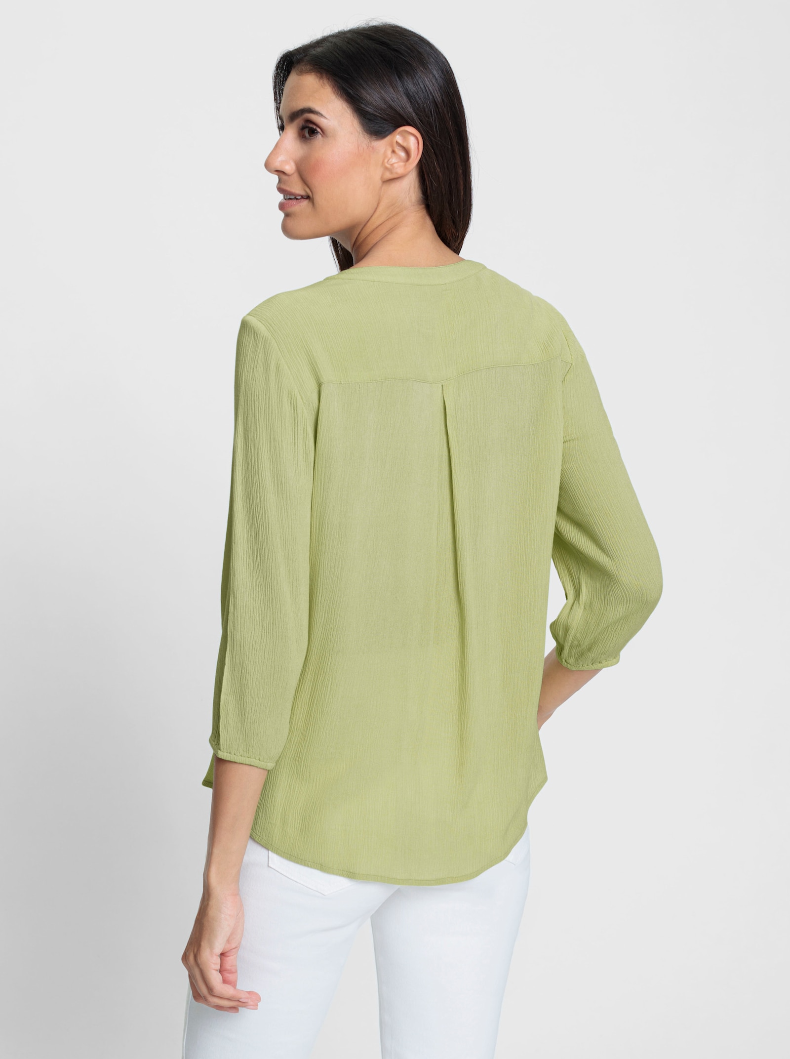 Schlupfbluse mit Smok-Einsatz vorne - lindgrün