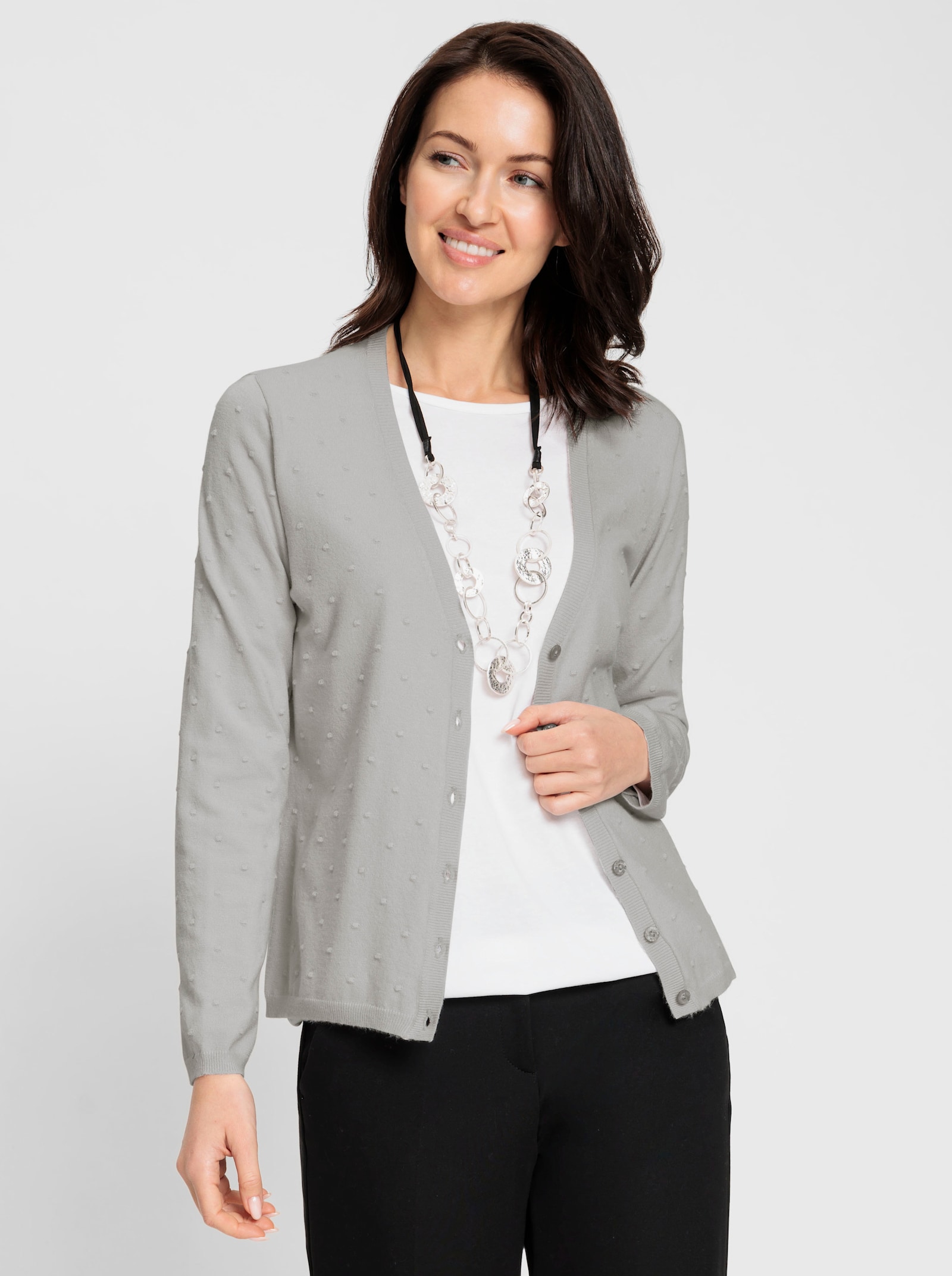 Strickjacke mit 3D-Tupfen - hellgrau