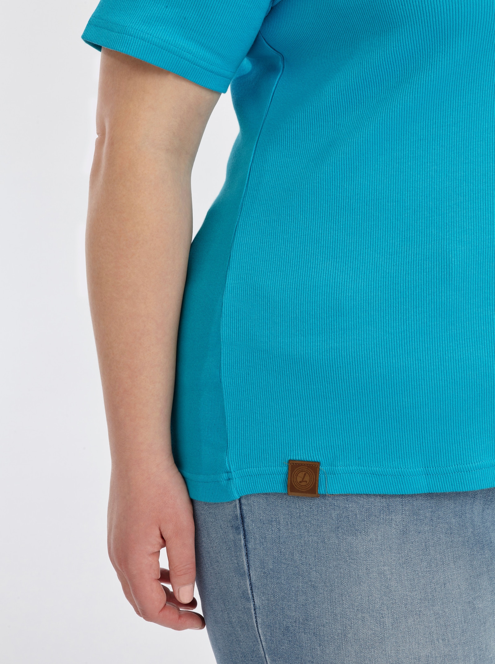 Poloshirt mit Ösen-Verzierung - türkis