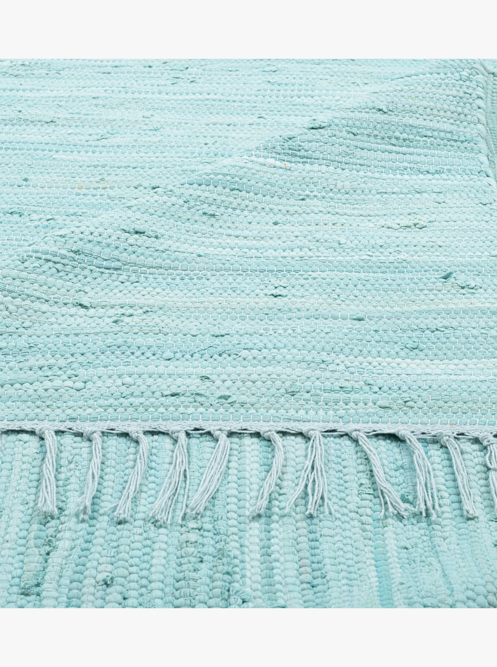 Theko Handwebteppich - hellblau