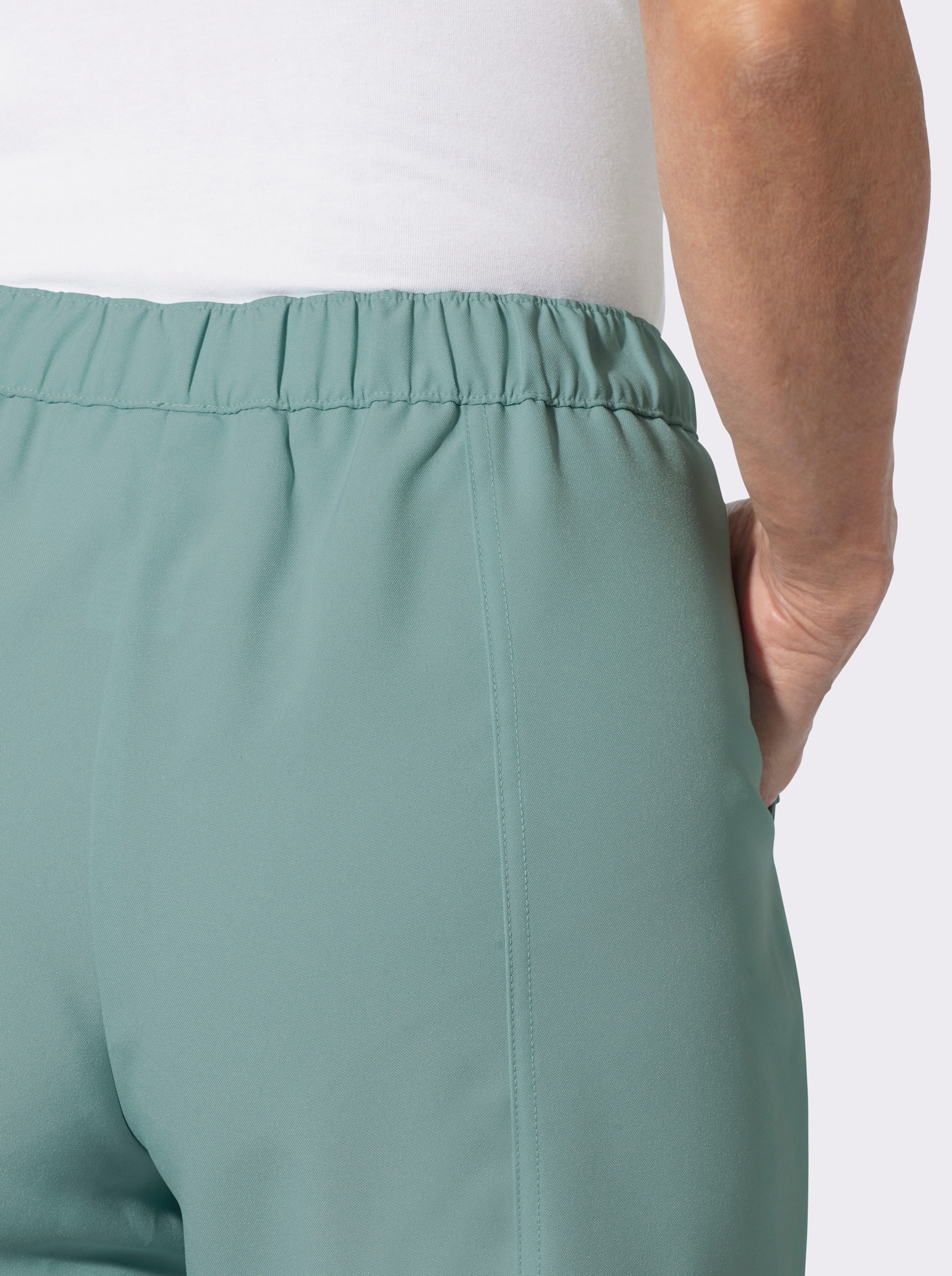 Schlupfhose mit Zierpatten an den Taschen - jade