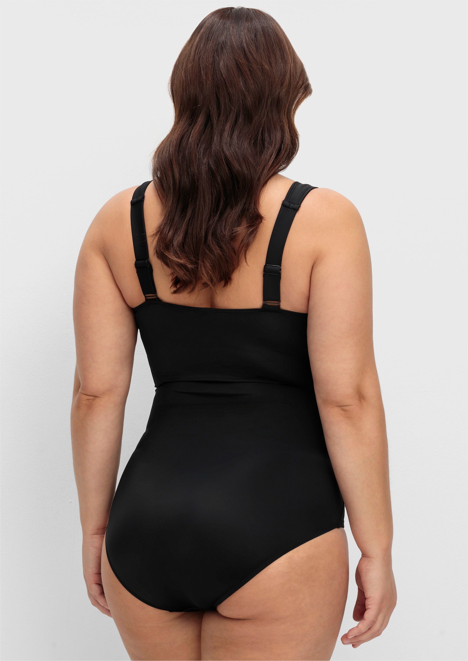 sheego Badeanzug mit Shaping-Effekt - schwarz-weiß