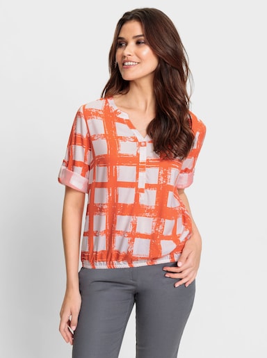 Comfortabele blouse - oranje/wit bedrukt