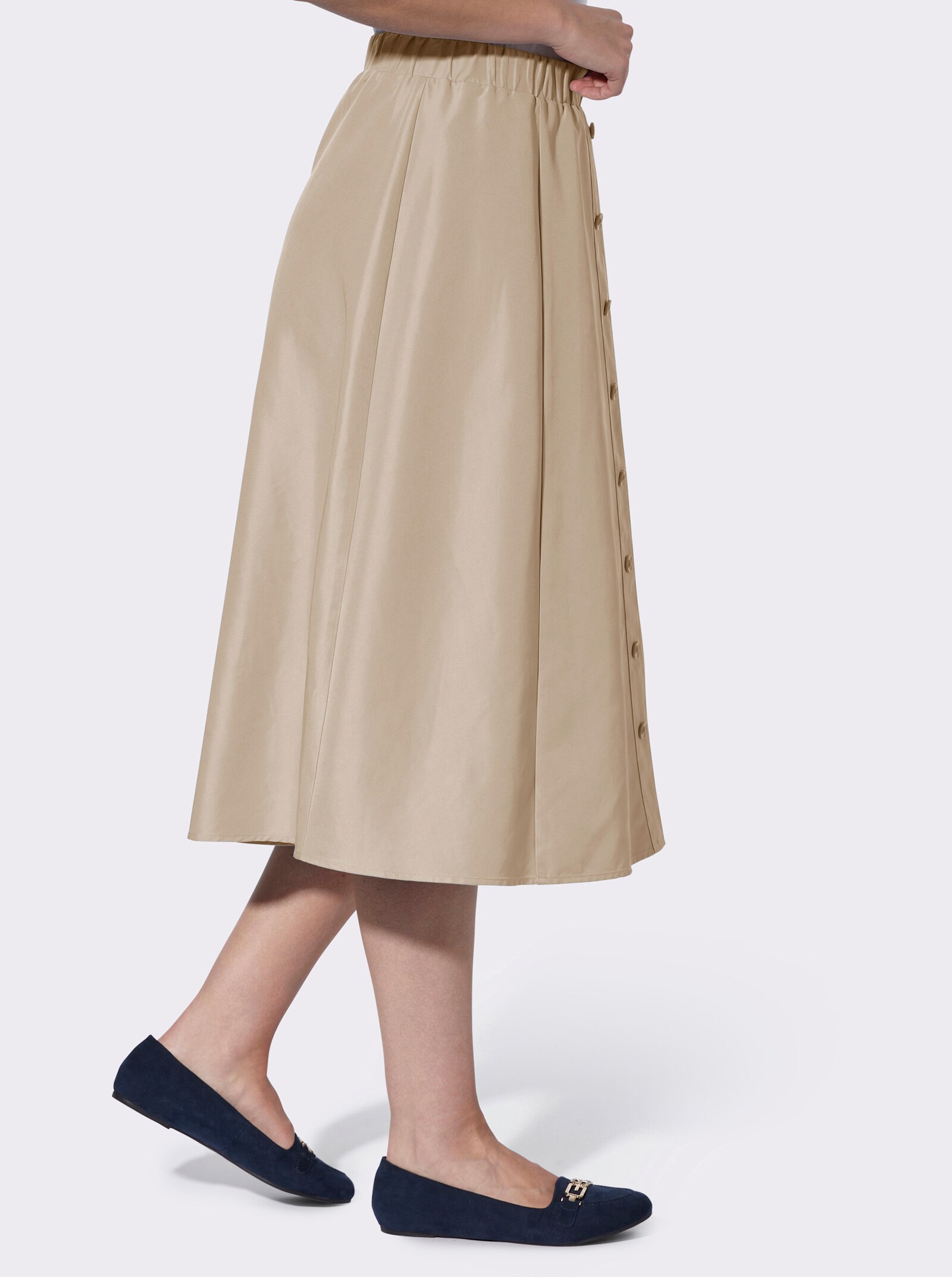 Kjol i utställd modell med fuskknappslå fram - beige