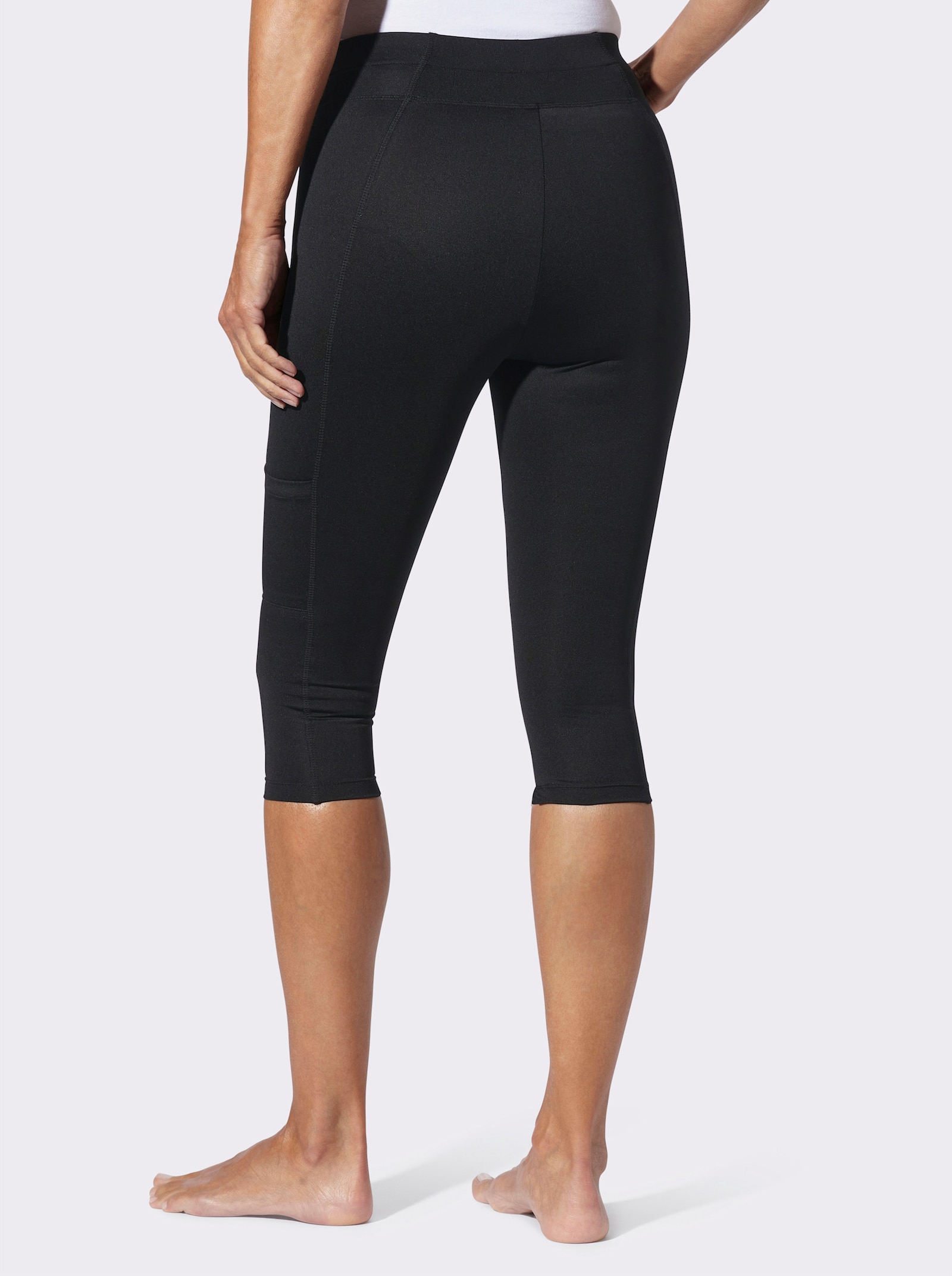 Caprilegging met een klein zakje - zwart