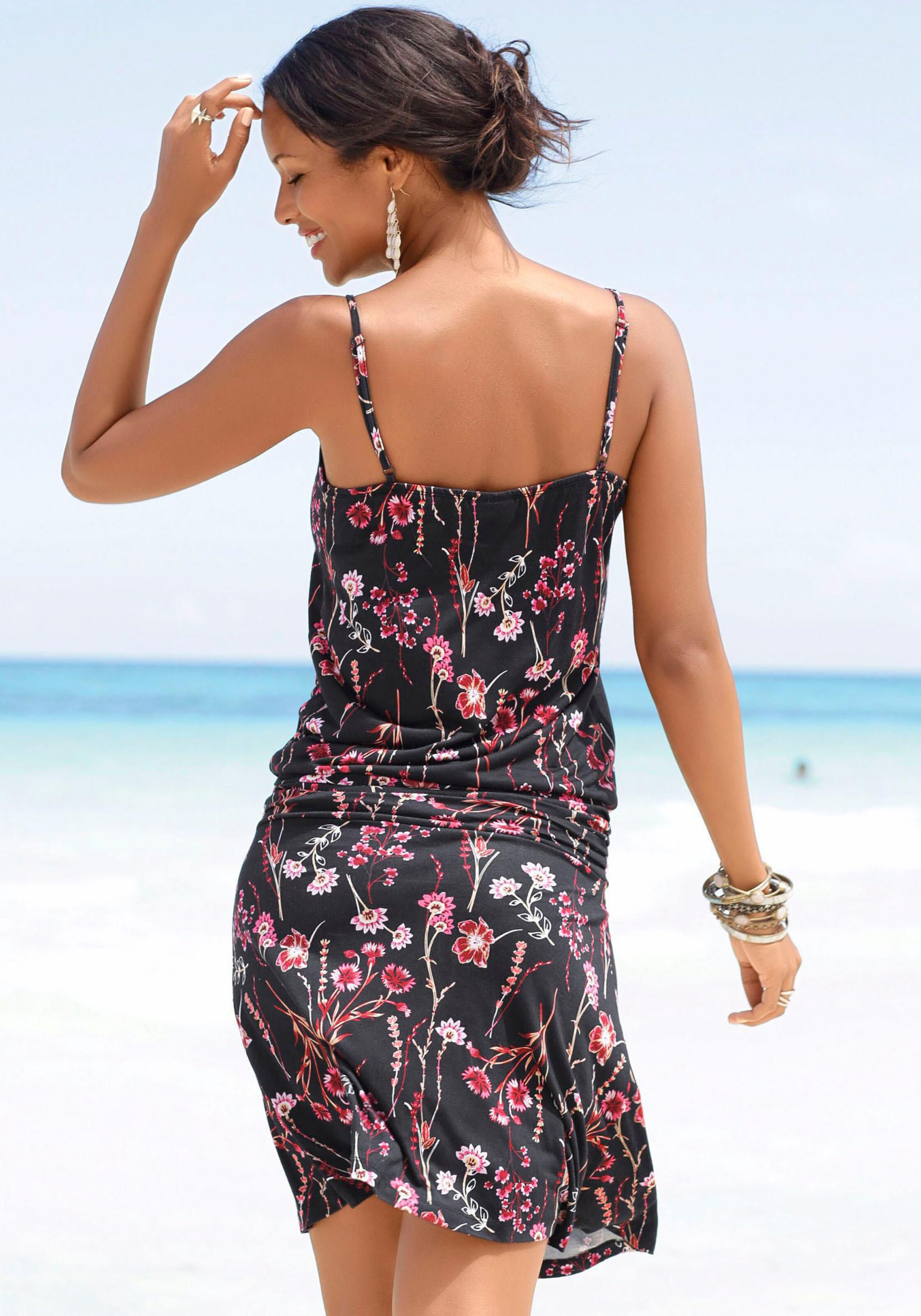 ein Kleid günstig Kaufen-Strandkleid in schwarz-bedruckt von LASCANA. Strandkleid in schwarz-bedruckt von LASCANA <![CDATA[Mit Alloverdruck, jedes Teil ein Unikat. Schmale Träger. Rocklänge ca. 38 cm. Aus 100% Viskose.]]>. 