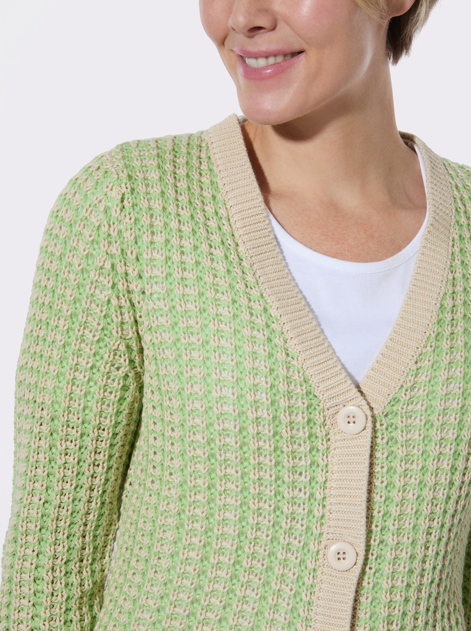 Strickjacke in zweifarbiger Melange-Optik - reseda-sand-gemustert