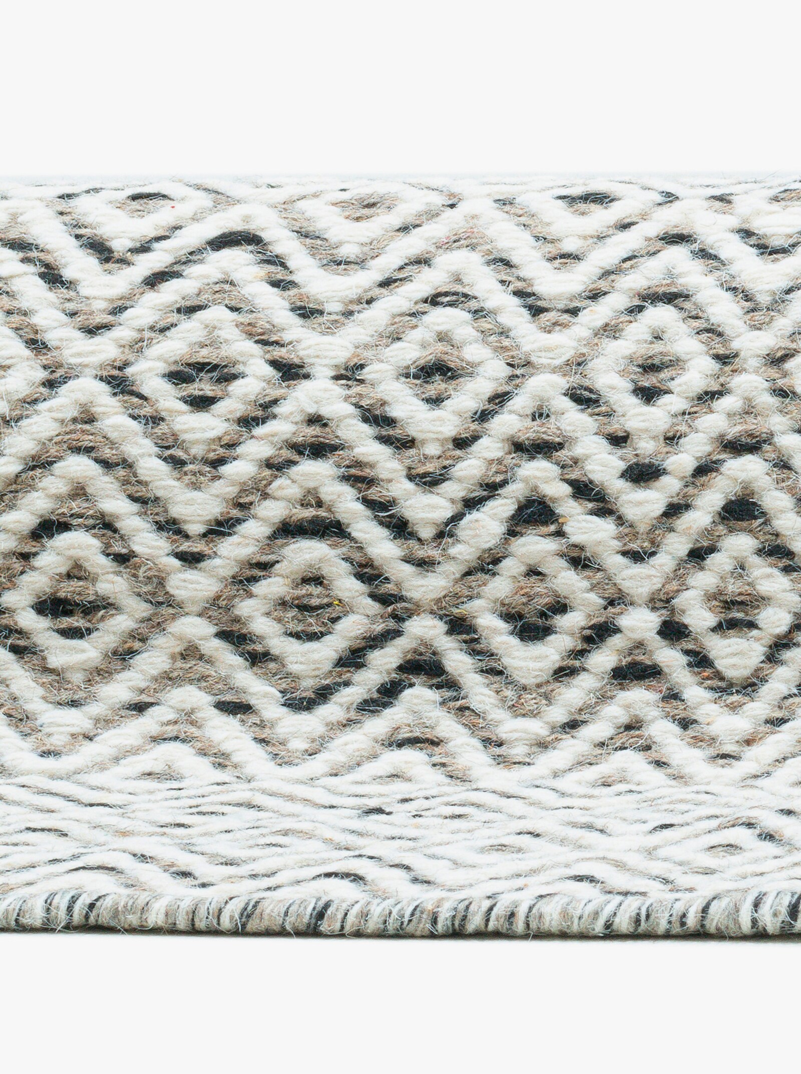 Theko Handwebteppich - grau