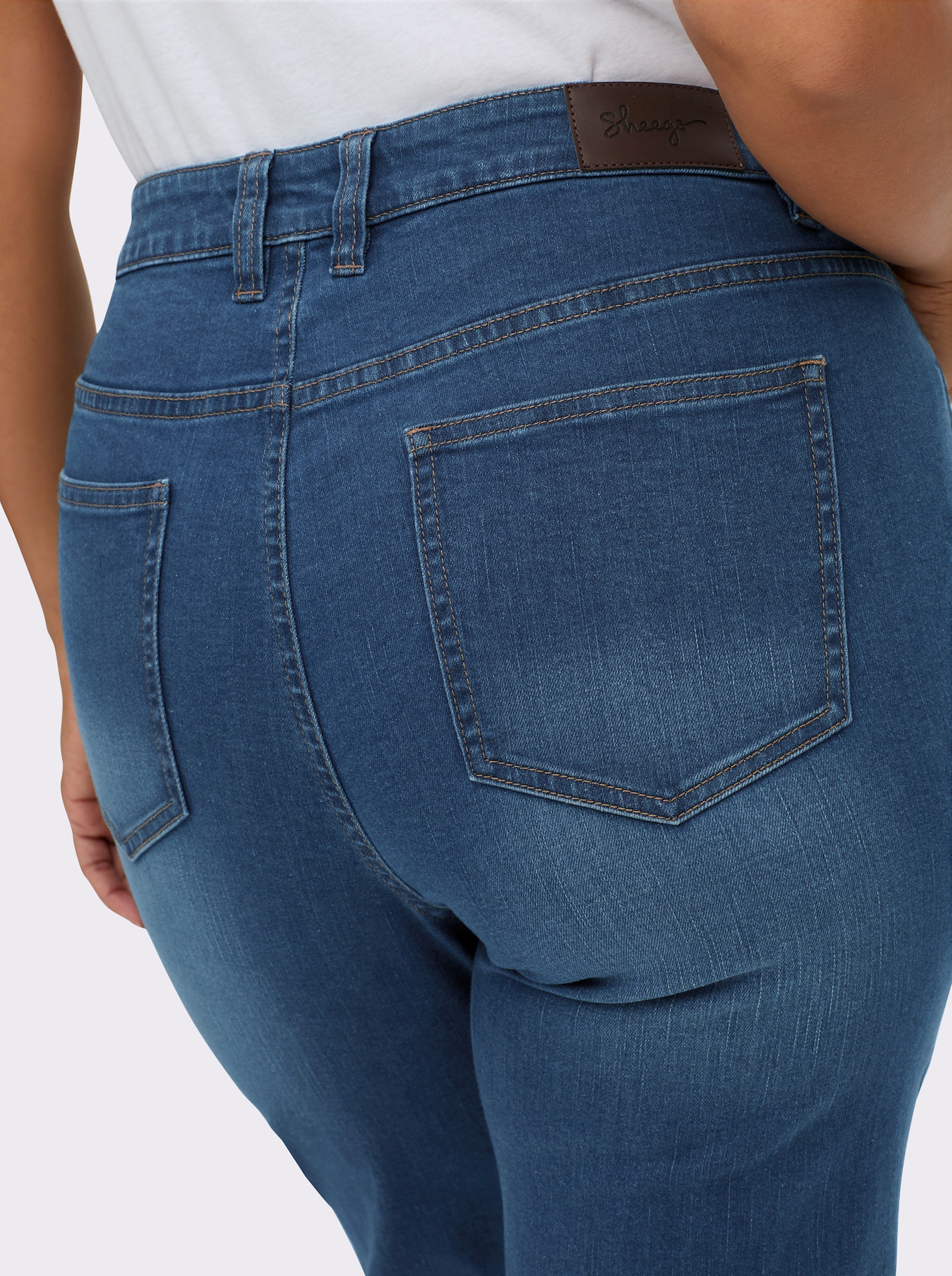 sheego Bootcut-Jeans mit Fransensaum - blue-stone-washed
