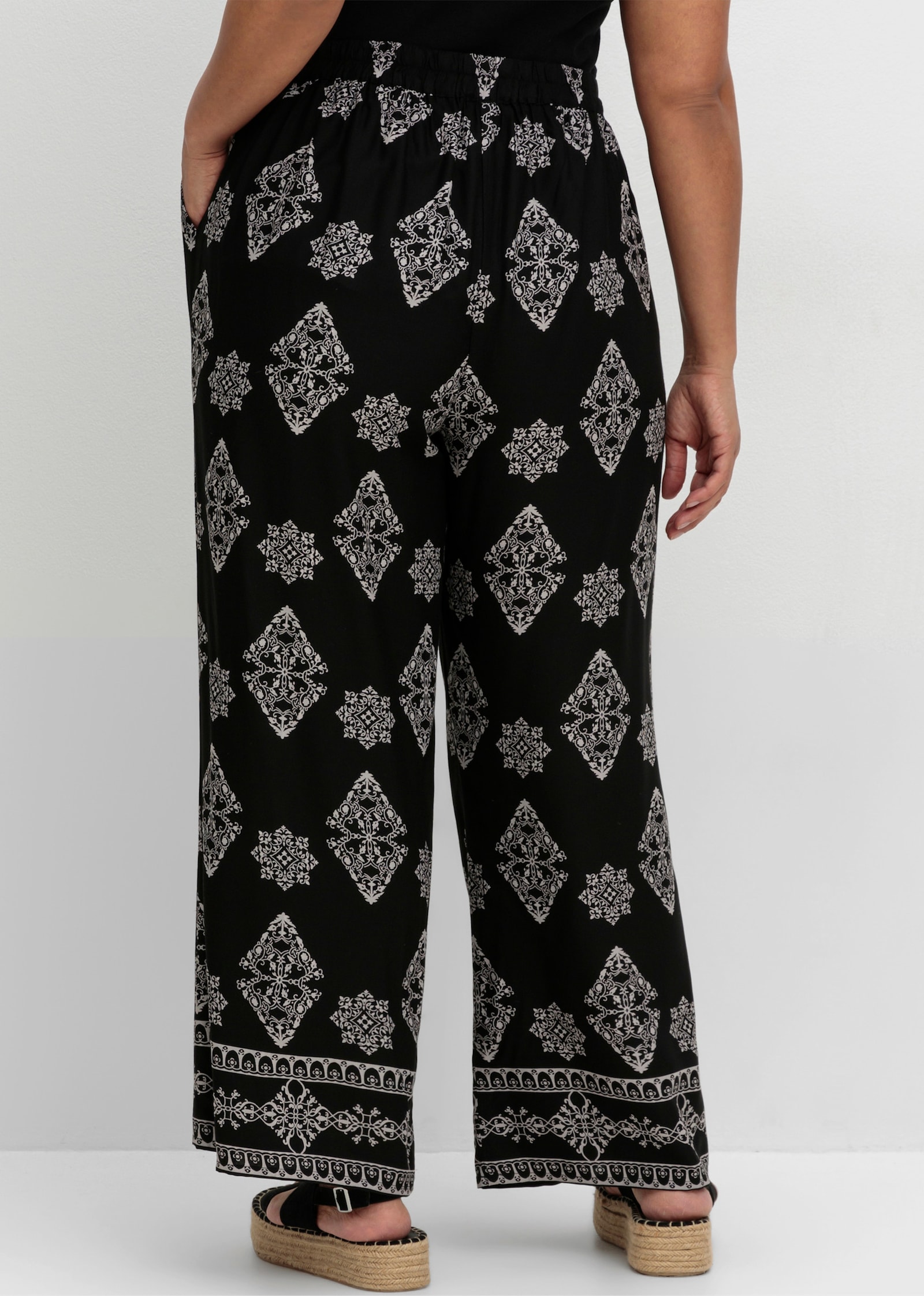 sheego by Joe Browns Schlupfhose mit weiter, gerader Beinform - schwarz-gemustert