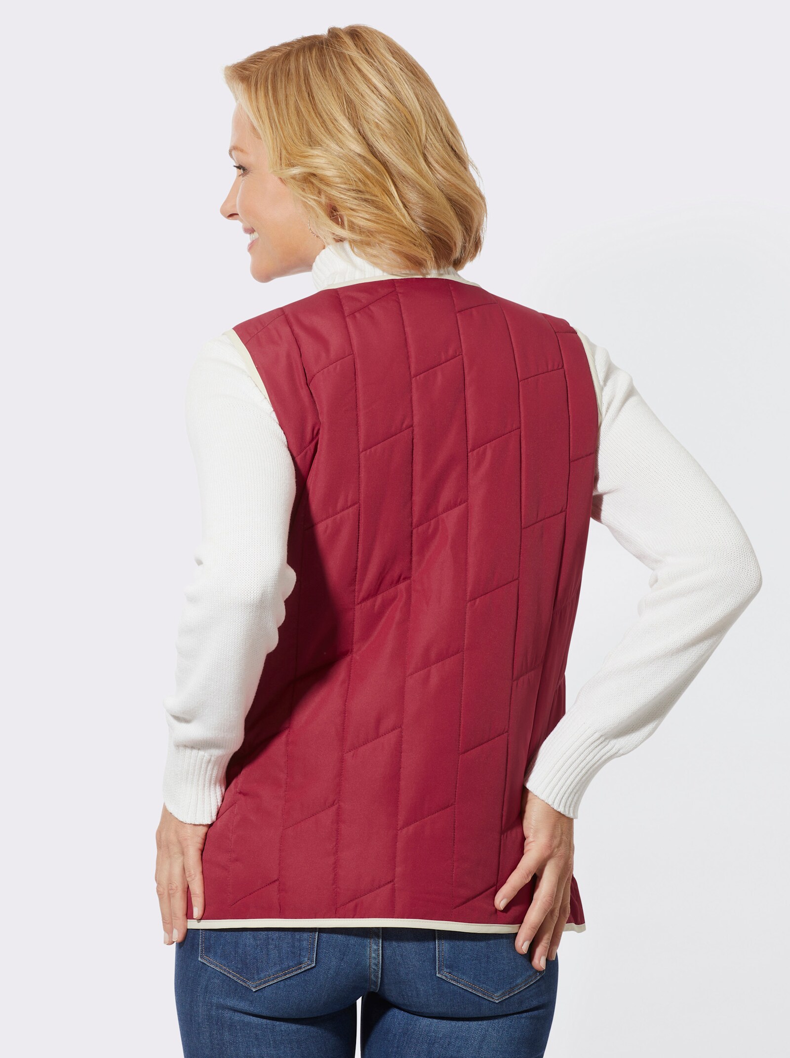 Bodywarmer met contrastkleurige paspels - kers