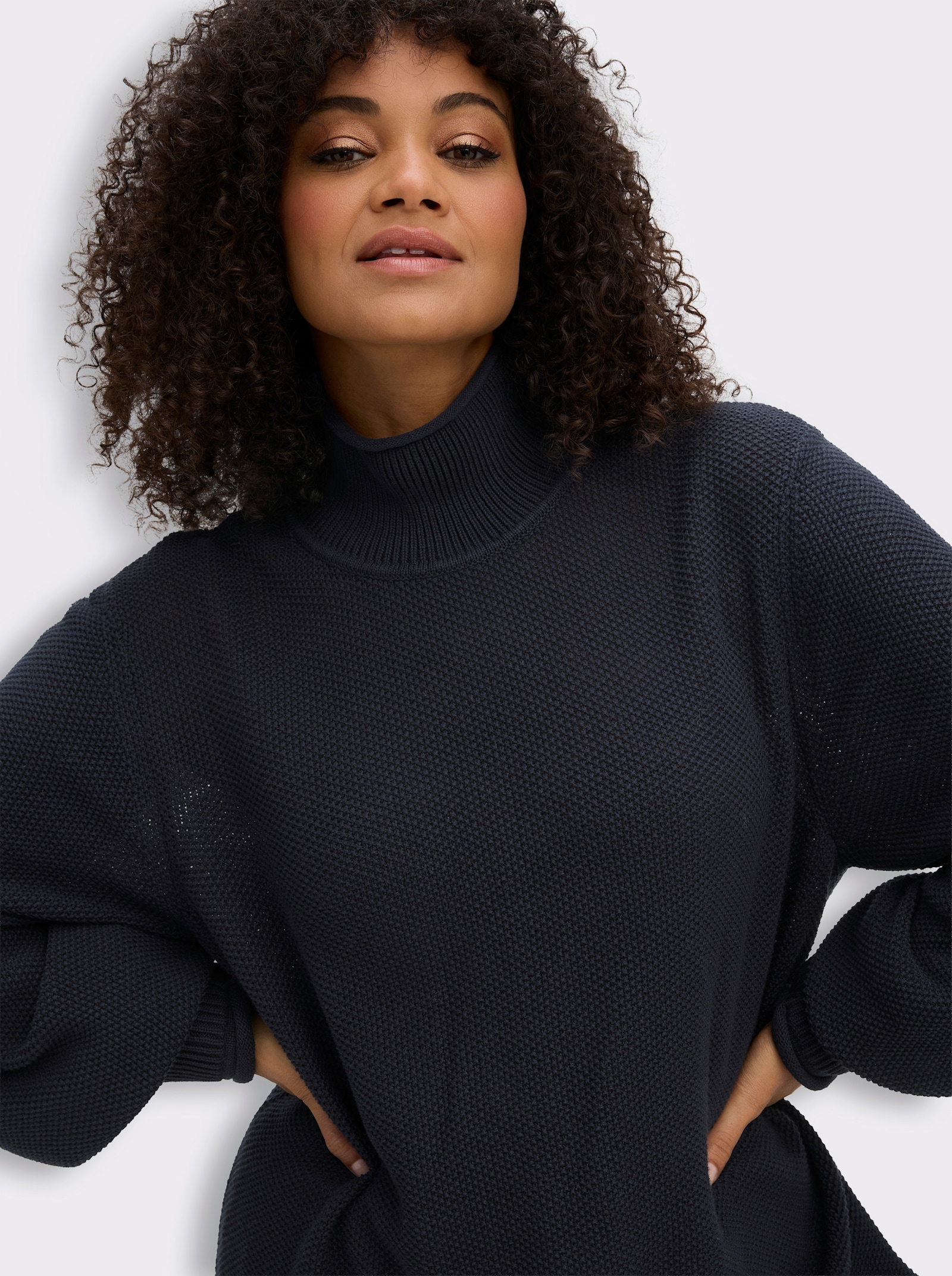 sheego Rollkragenpullover mit gerippten Bündchen - tiefblau