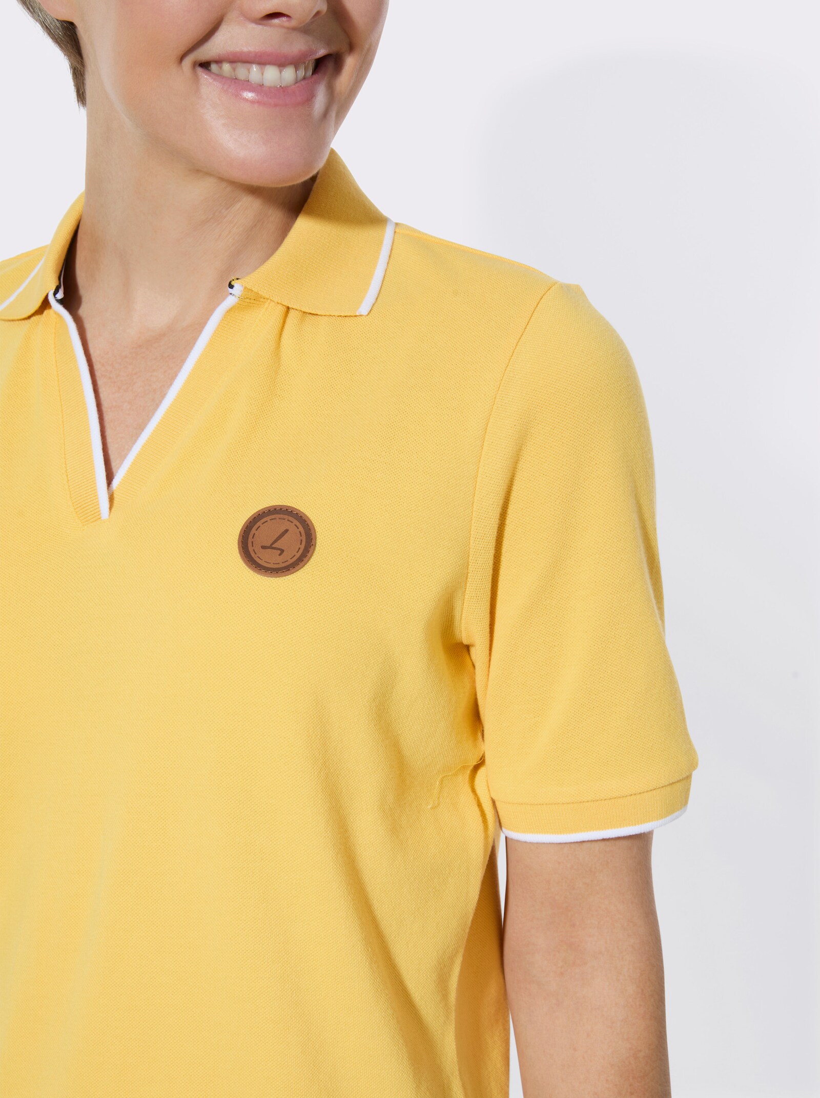 Poloshirt mit Kontrastdetails - gelb