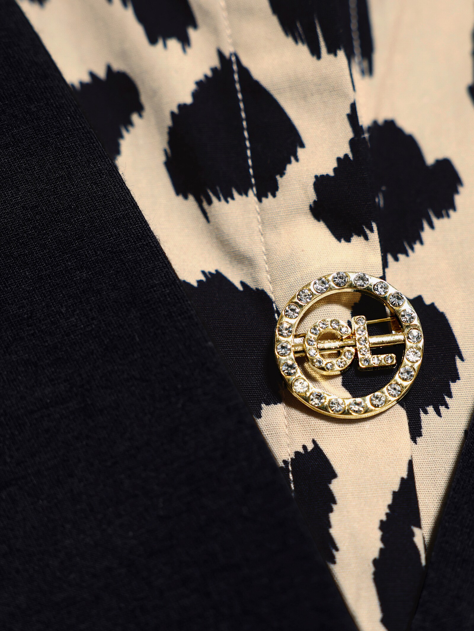 Sweatshirt mit Leo-Einsatz - schwarz-sand